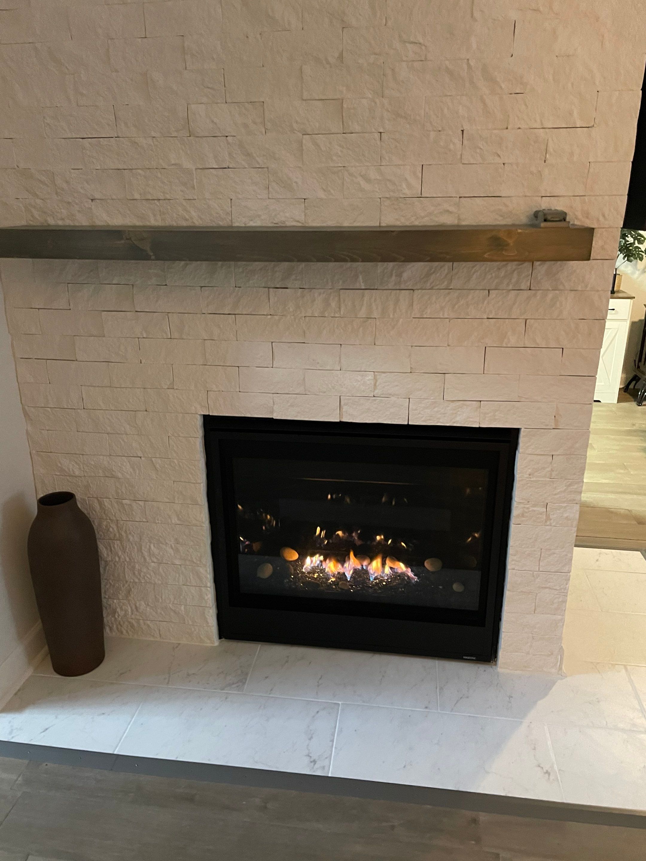 New Gas Fireplace  by Neighborhood Chimney Services 