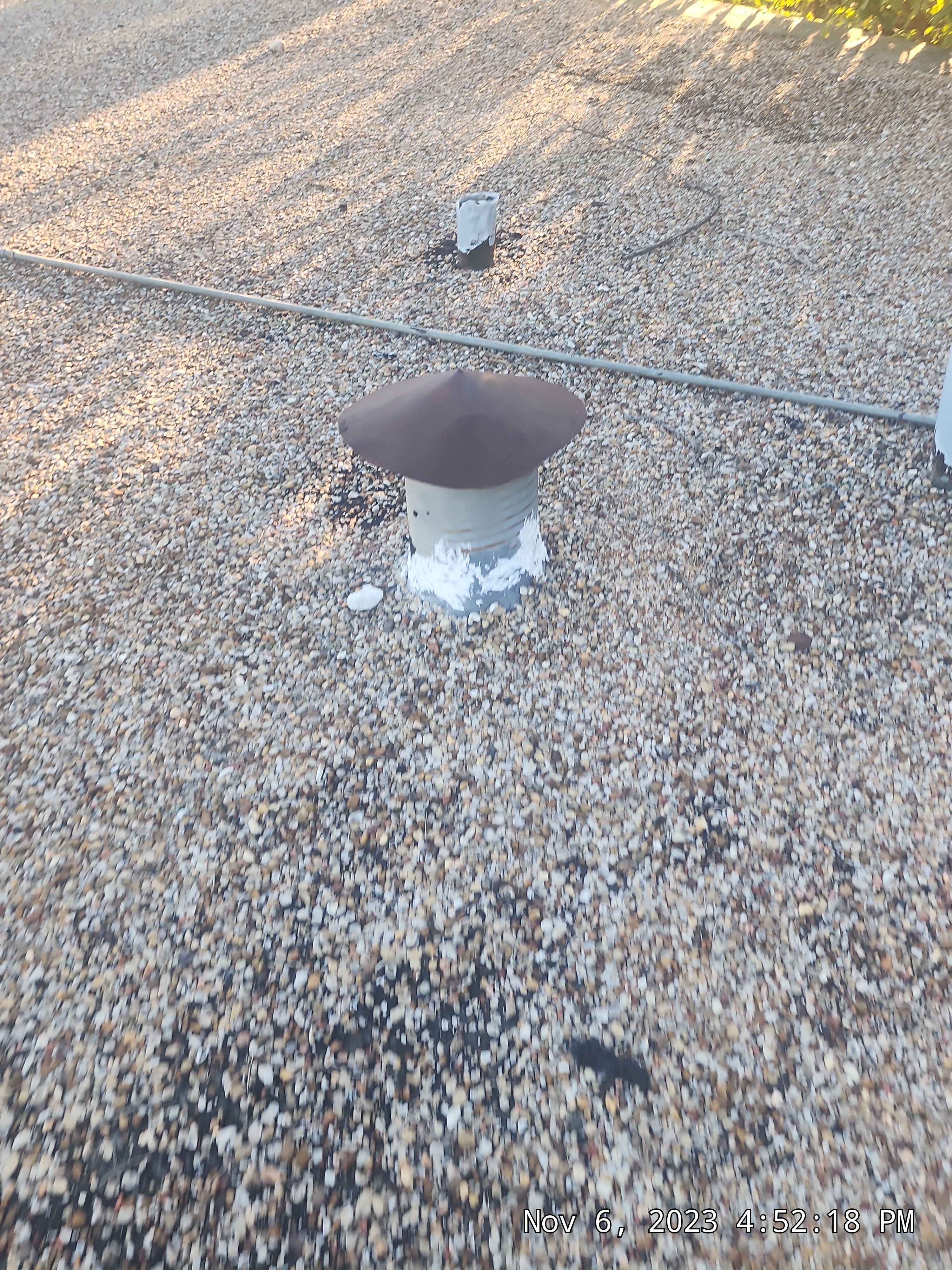 Commercial roofing overlay using GAF TPO over an old ballast roof by Becker Roofing and Exteriors