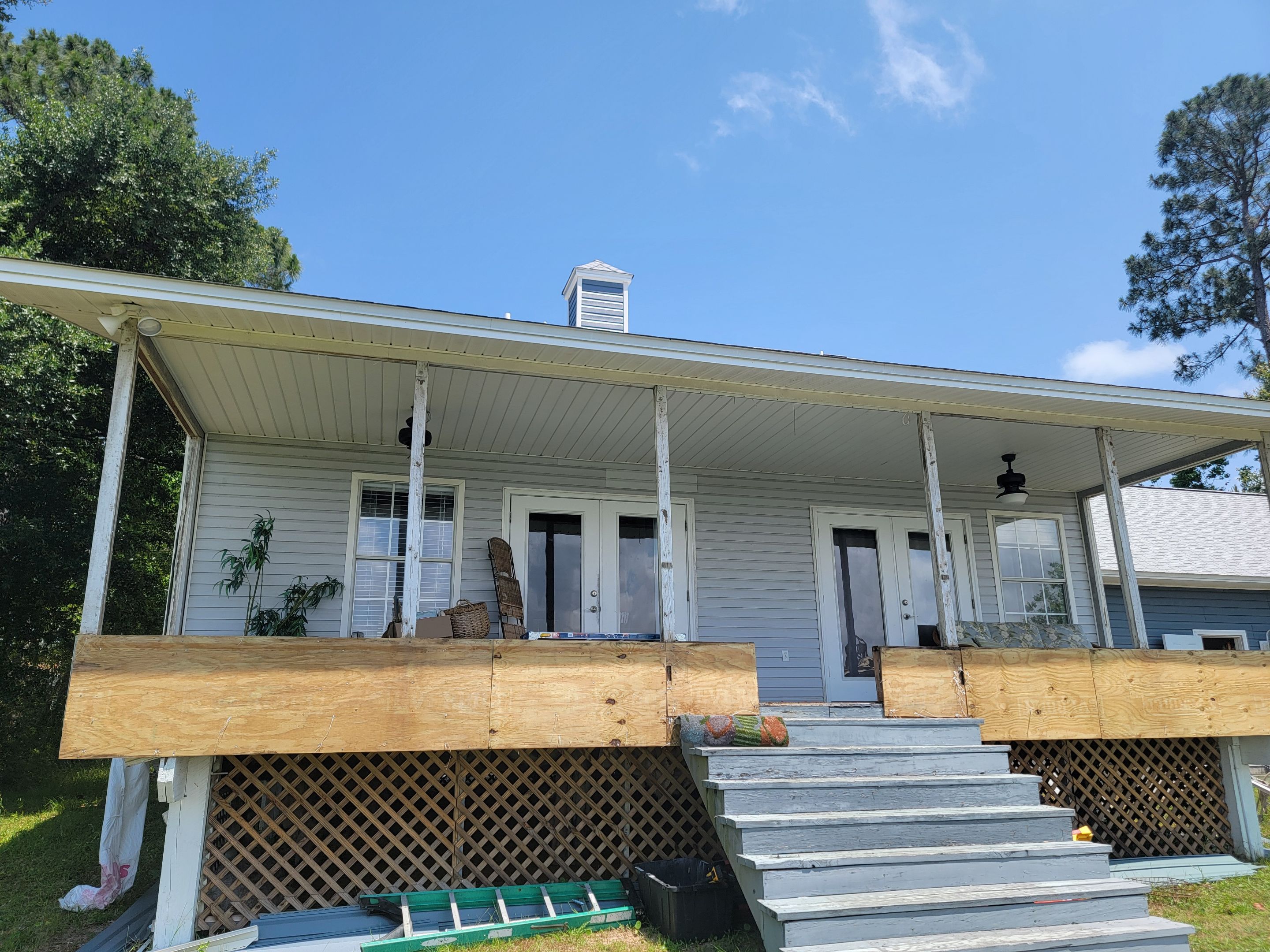 Glass Under w/Stairs in Milton by Titan Sunrooms