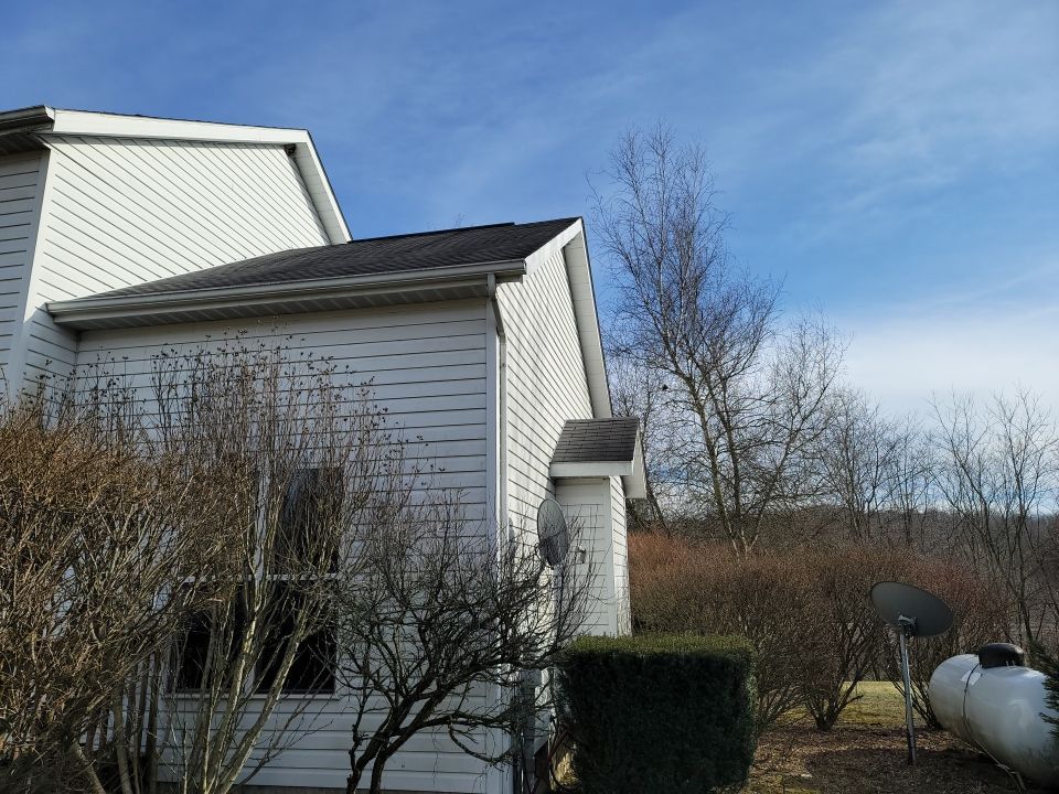 ATLAS PINNACLE COLOR: BLACK SHADOW DRIP EDGE: WHITE by Eagle Eye Roofing