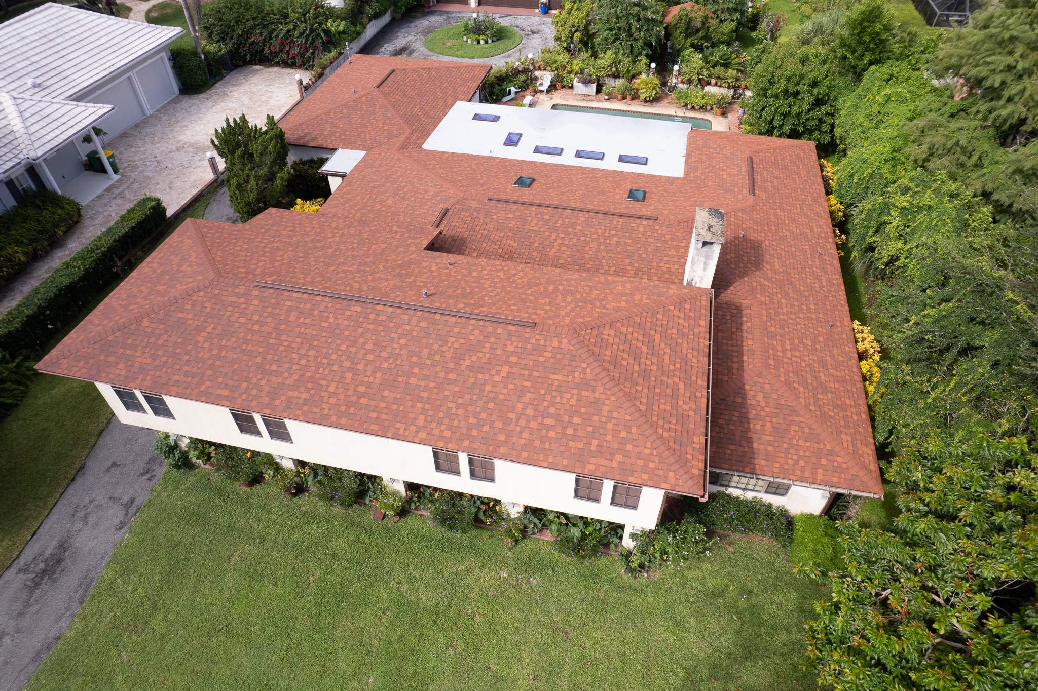 Cocoa Residential Roof Replacement Featuring Integrated Skylights and Flat Roofing by Wiedmann Construction & Roofing