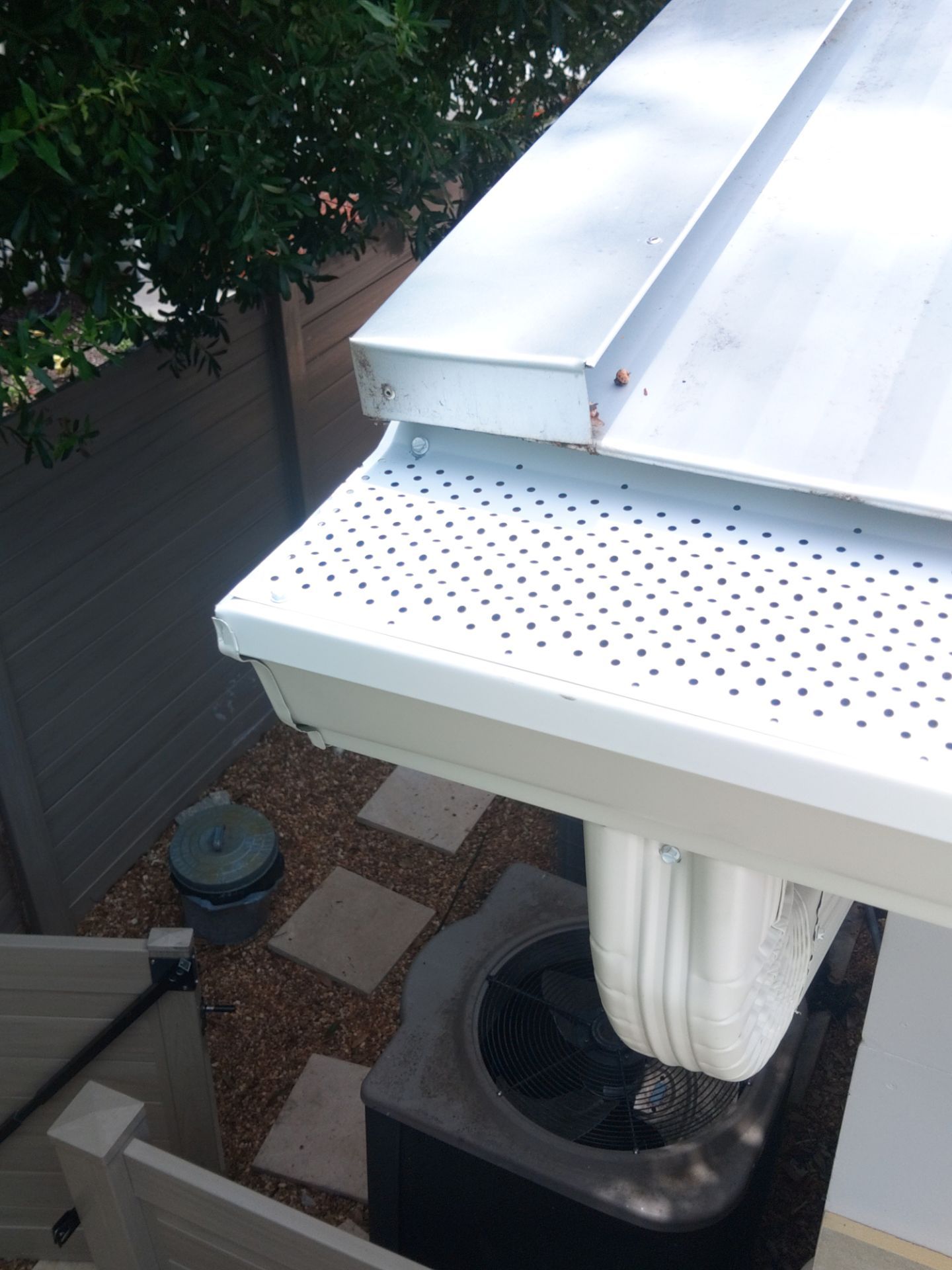 Aluminum Seamless Gutters using 3X4 Elbow Downspout in Sarasota FL by Gutter Professors