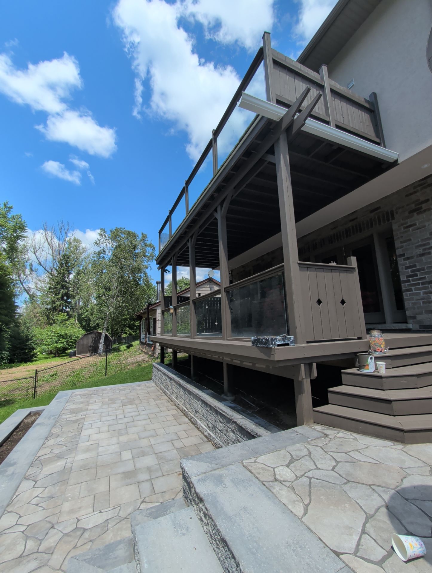 Multi-Level Deck Restoration and Glass Railing Installation in King by GTA HOME PAINTING