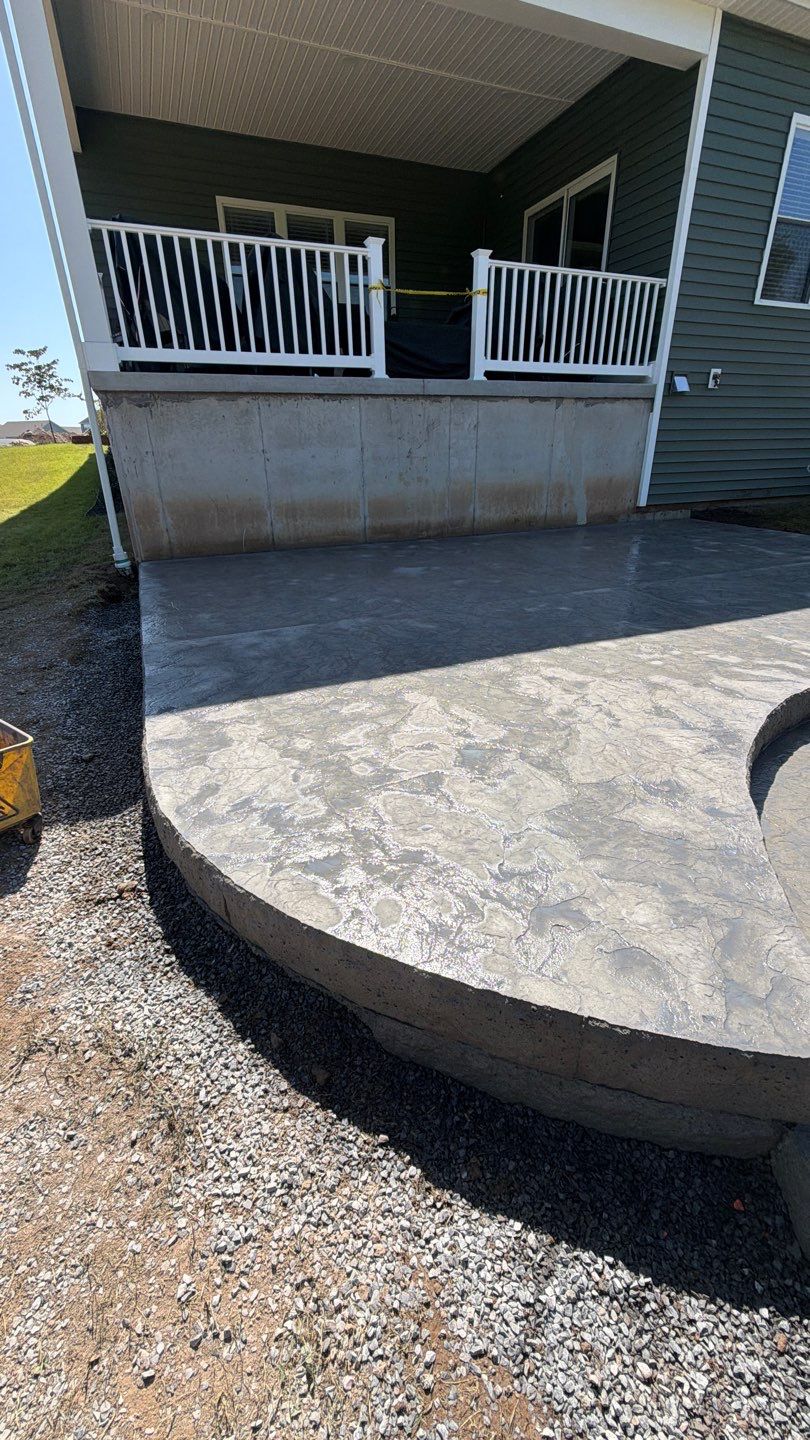 Oxford Slate Patio with Fire Pit by NG Masonry & Construction LLC