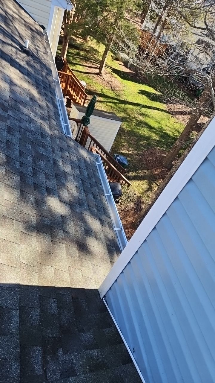 Gutter Cleaning using water by Power Wash Masters LLC