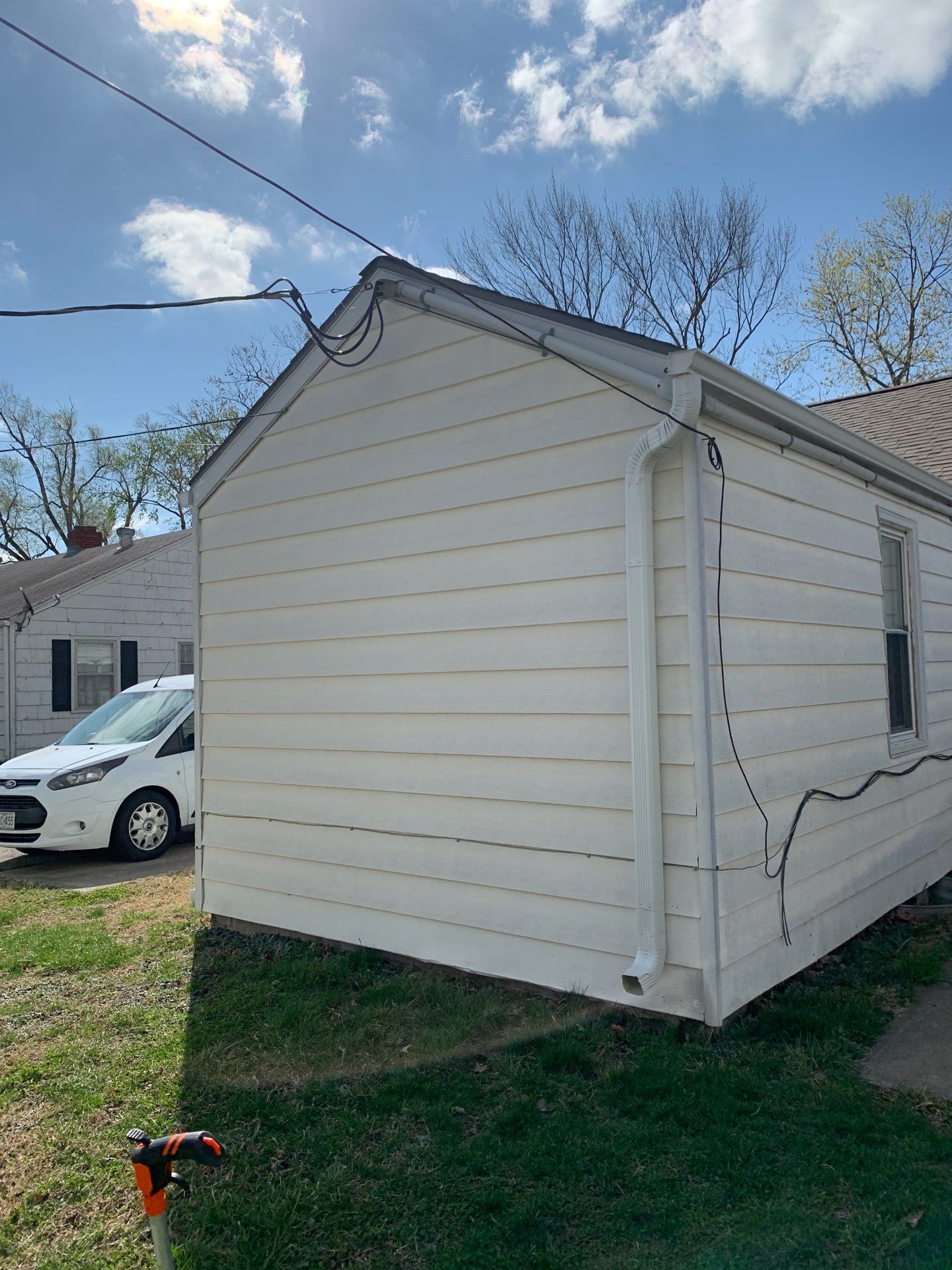 New Cypress Siding going on this North Kansas City Home  by EEC  Windows, Siding & Roofing 