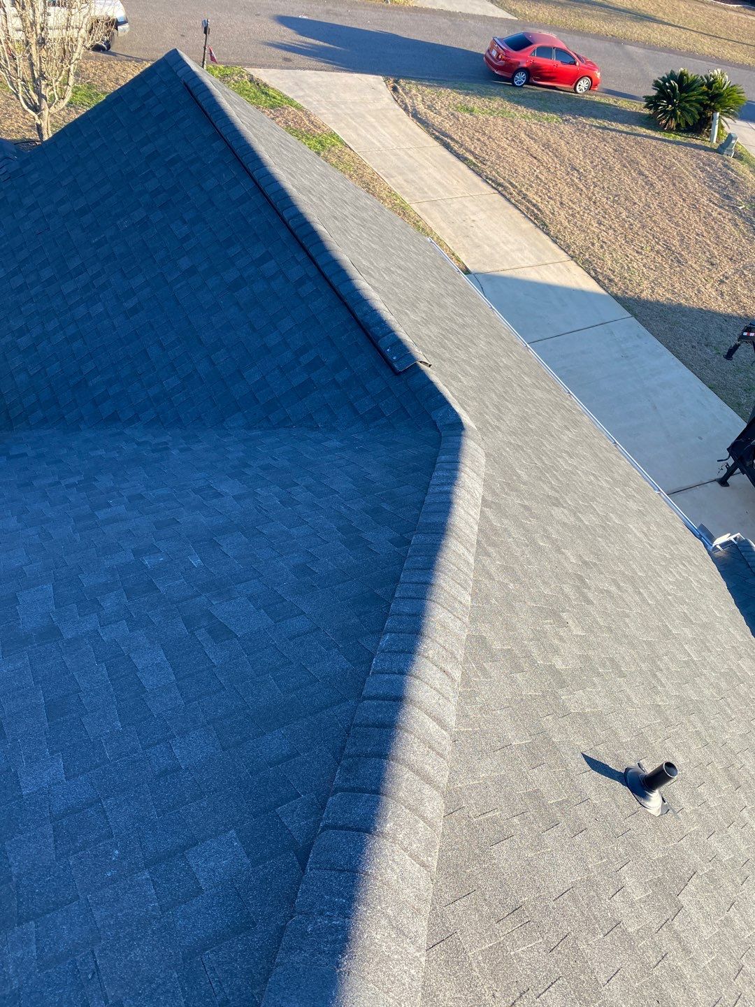 Residential Roofing Installation using Roof Replacement by American Roofing & Construction LLC