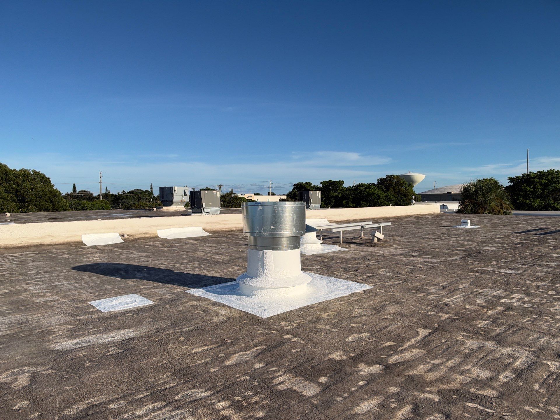 Commercial Roof Restoration and Ventilation Upgrades in Deerfield Beach by Roof King LLC