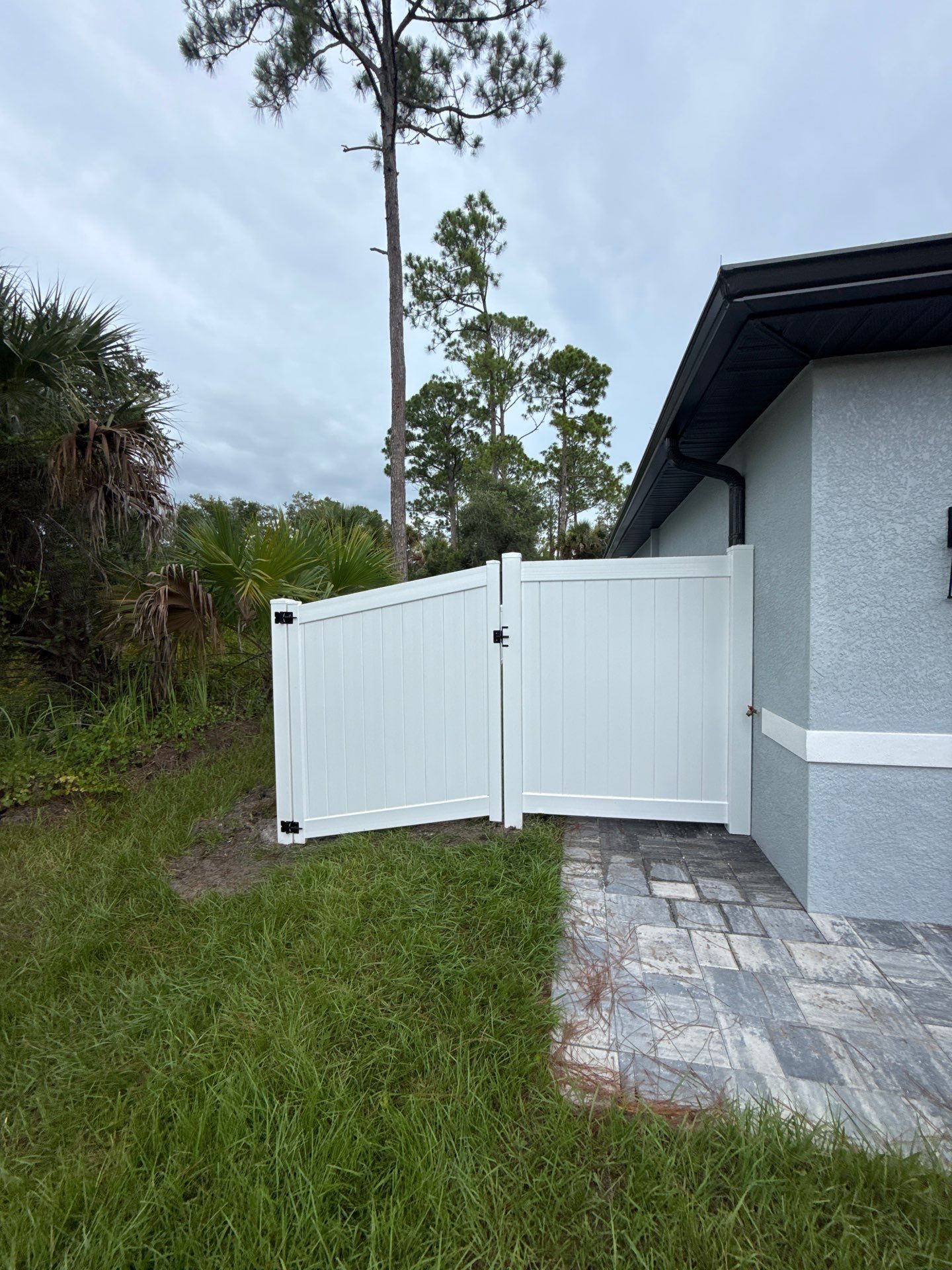 White Vinyl Privacy Fence Installation in North Port by True Fence LLC