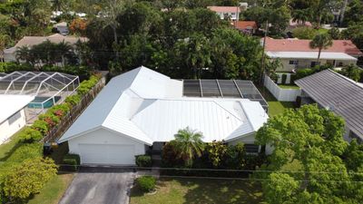 Residential Roofing Installation using 1" Nail strip metal roof