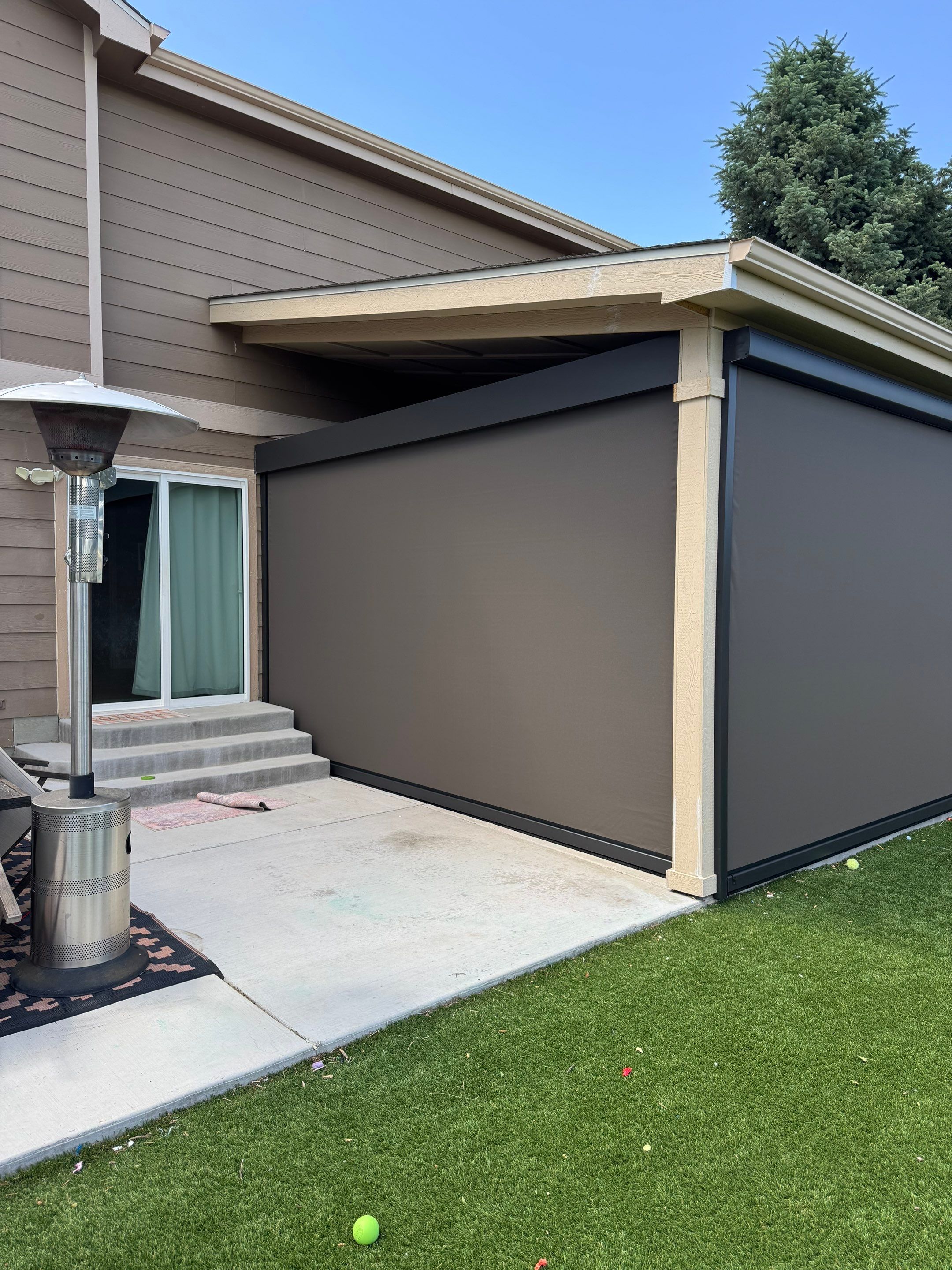 Motorized MagnaTrack Privacy Screen Installation on Castle Rock Patio by Outdoor Solutions Colorado