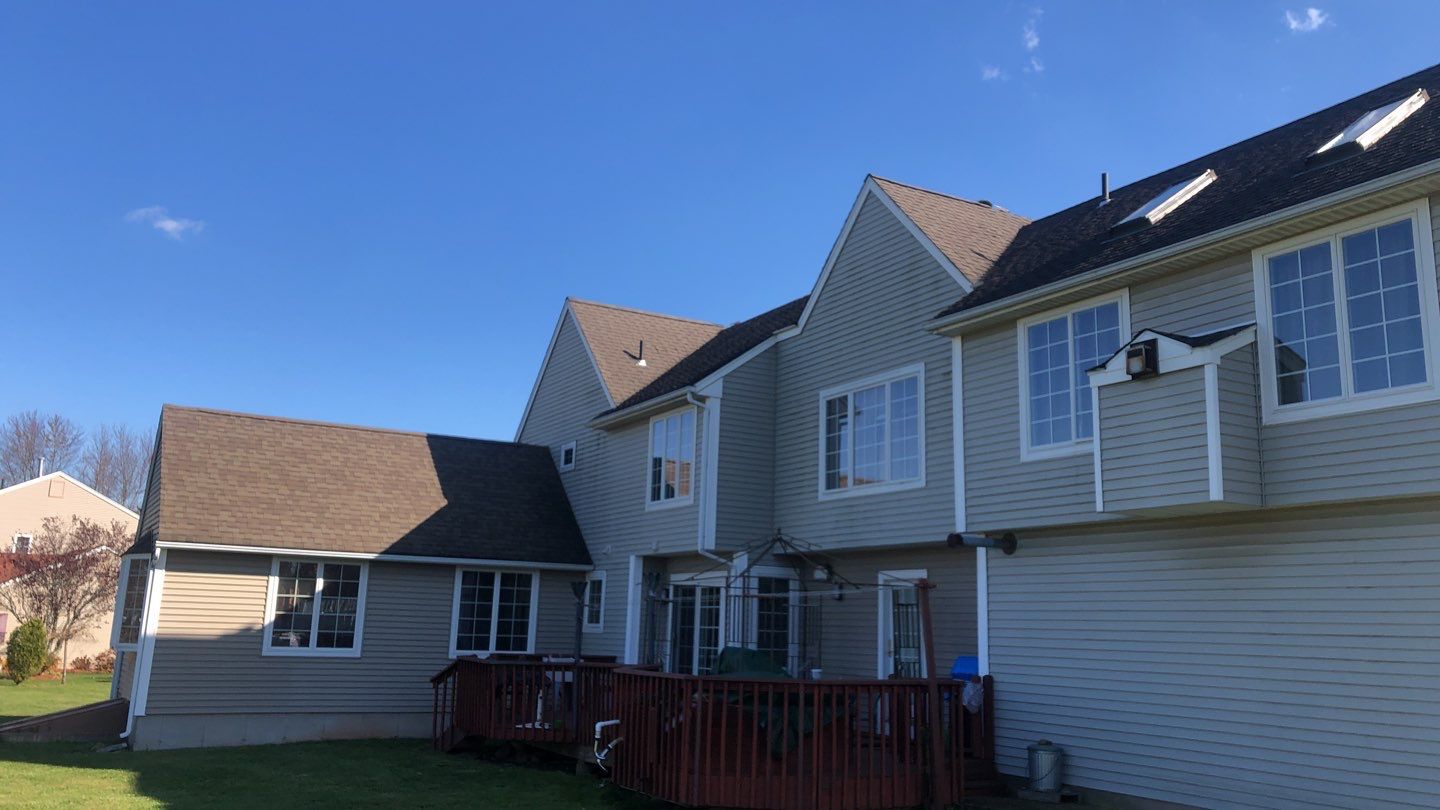 Commercial Roofing Installation using Owens Corning TruDefinition driftwood by A Plus Exterior