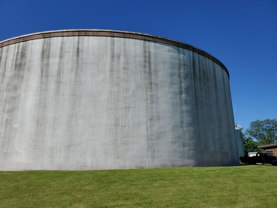 Water tank cleaning by Northern Power Washing LLC.