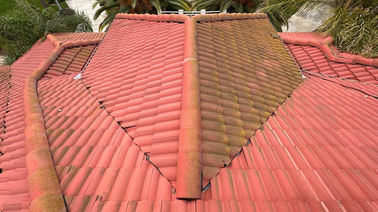 Tile refurbish project using existing tiles and replaced underlayment and battens by Straight Edge Roofing Inc