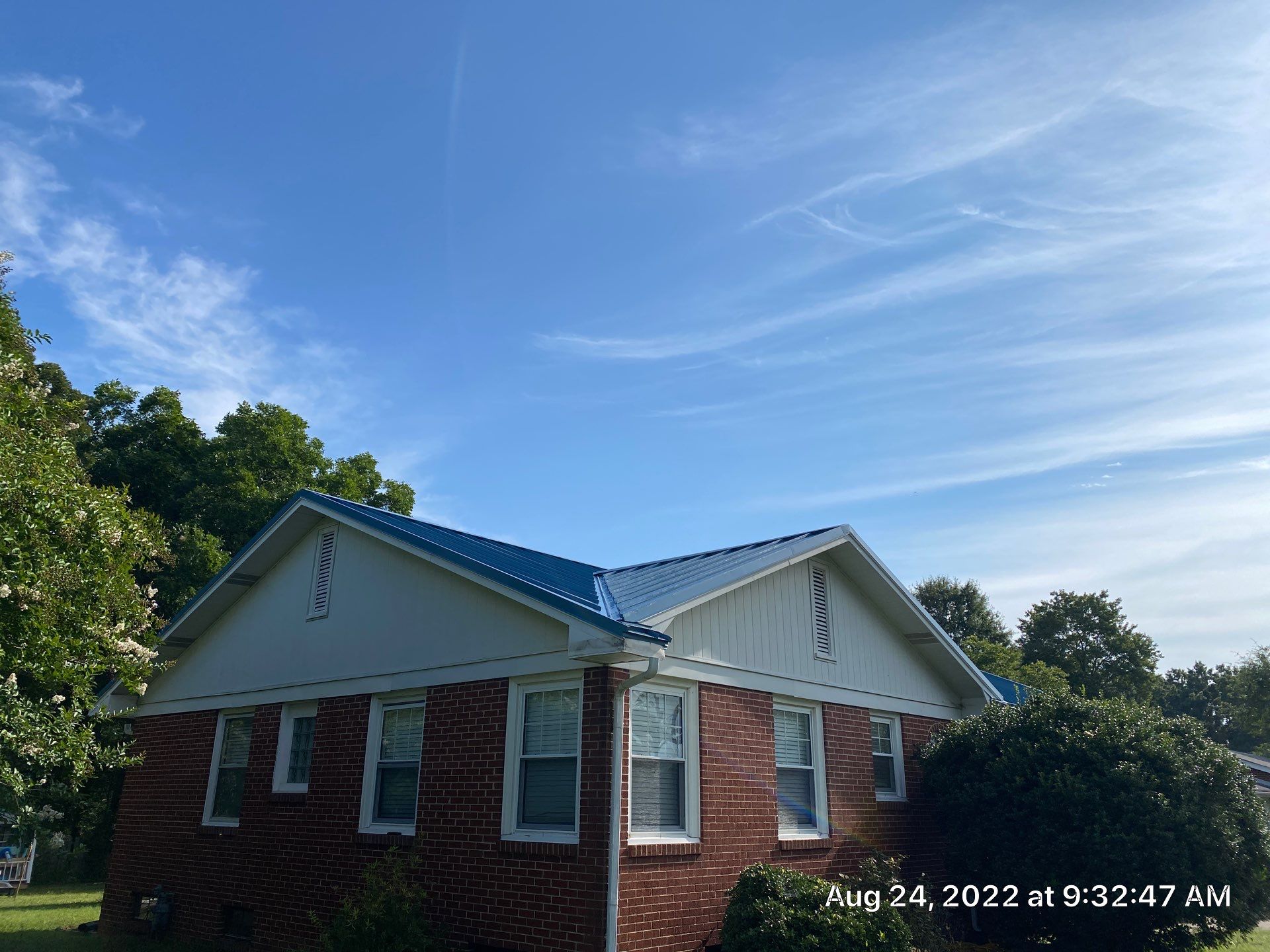 Carolina Blue Standing Seam Roof by Just In Time Roofing and Restoration