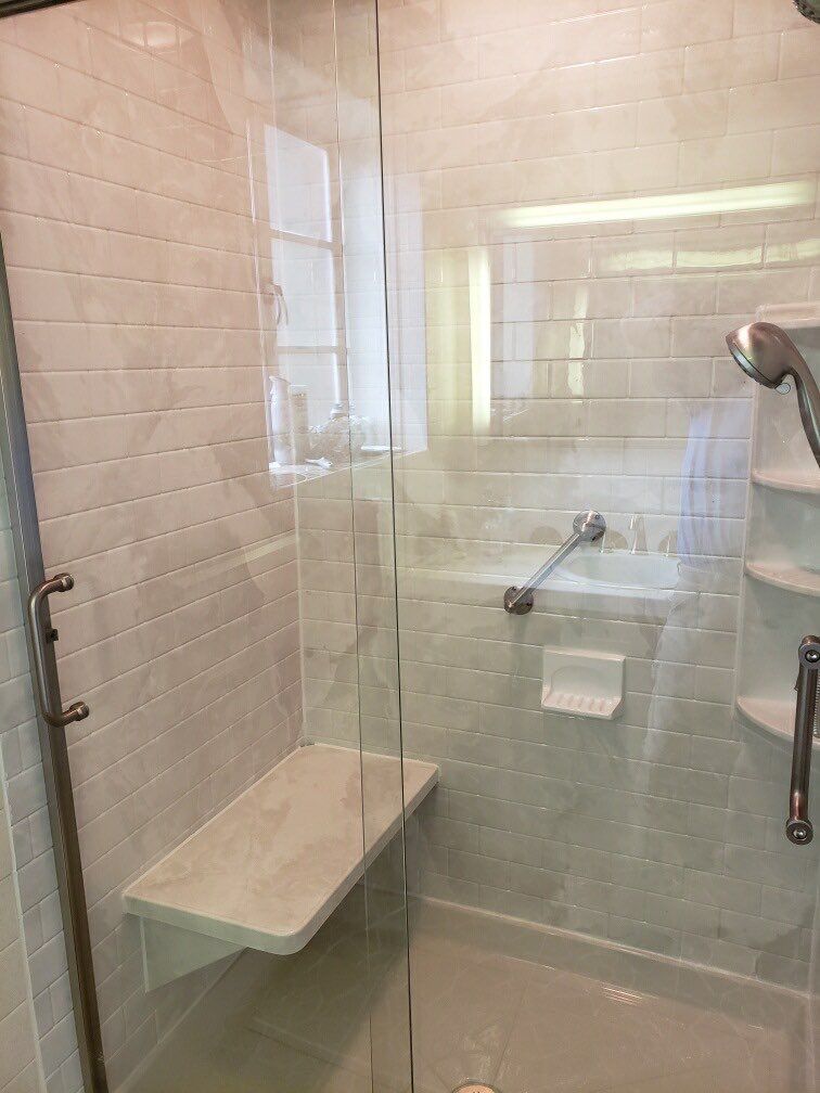 Shower Replacement using BCI Acrylic Shower System by Secure Construction Company Inc