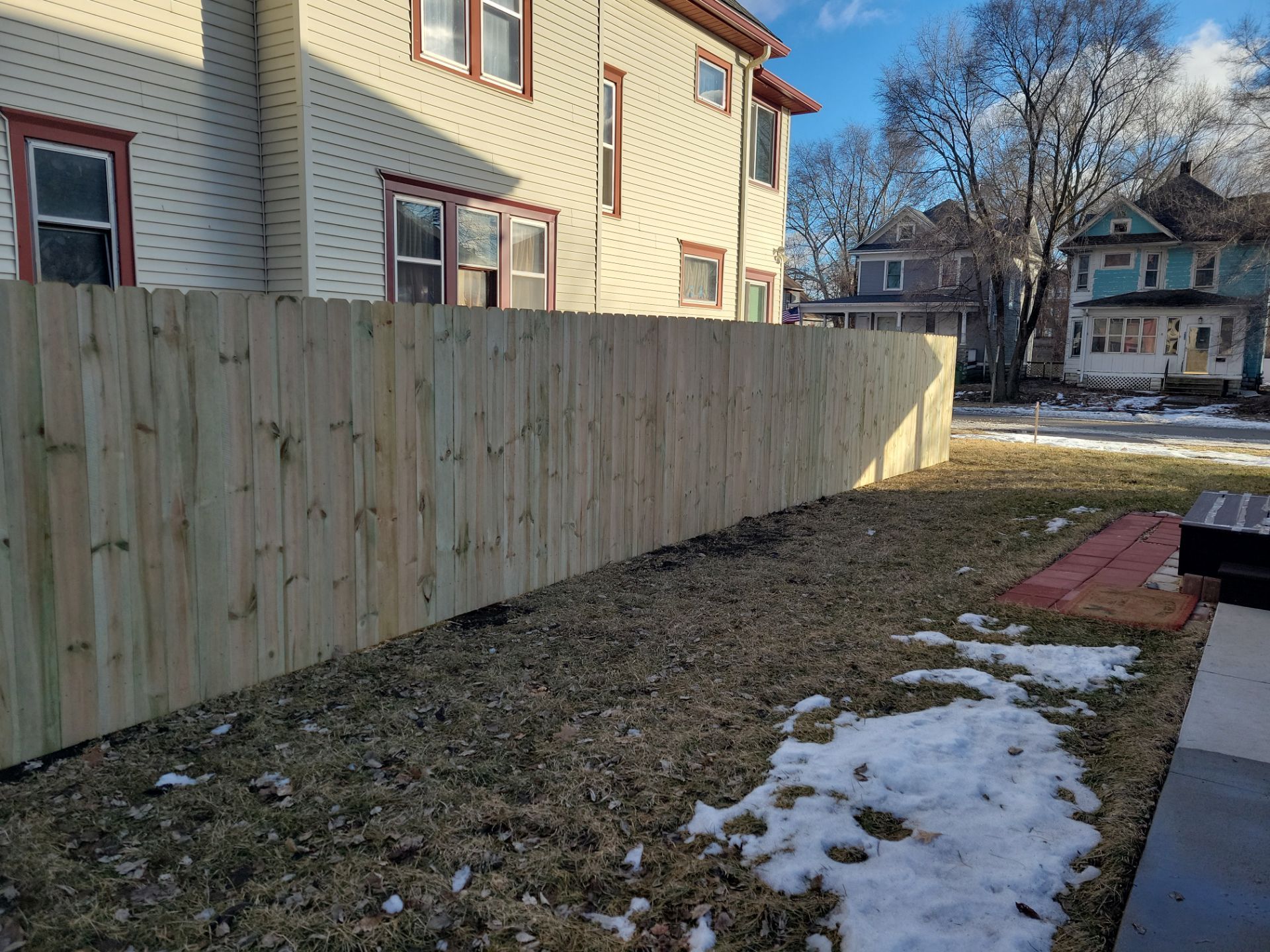 Pressure-Treated Wood Privacy Fence and Double Gate Installation in Waterloo by Perfect Picket Fence and Stain