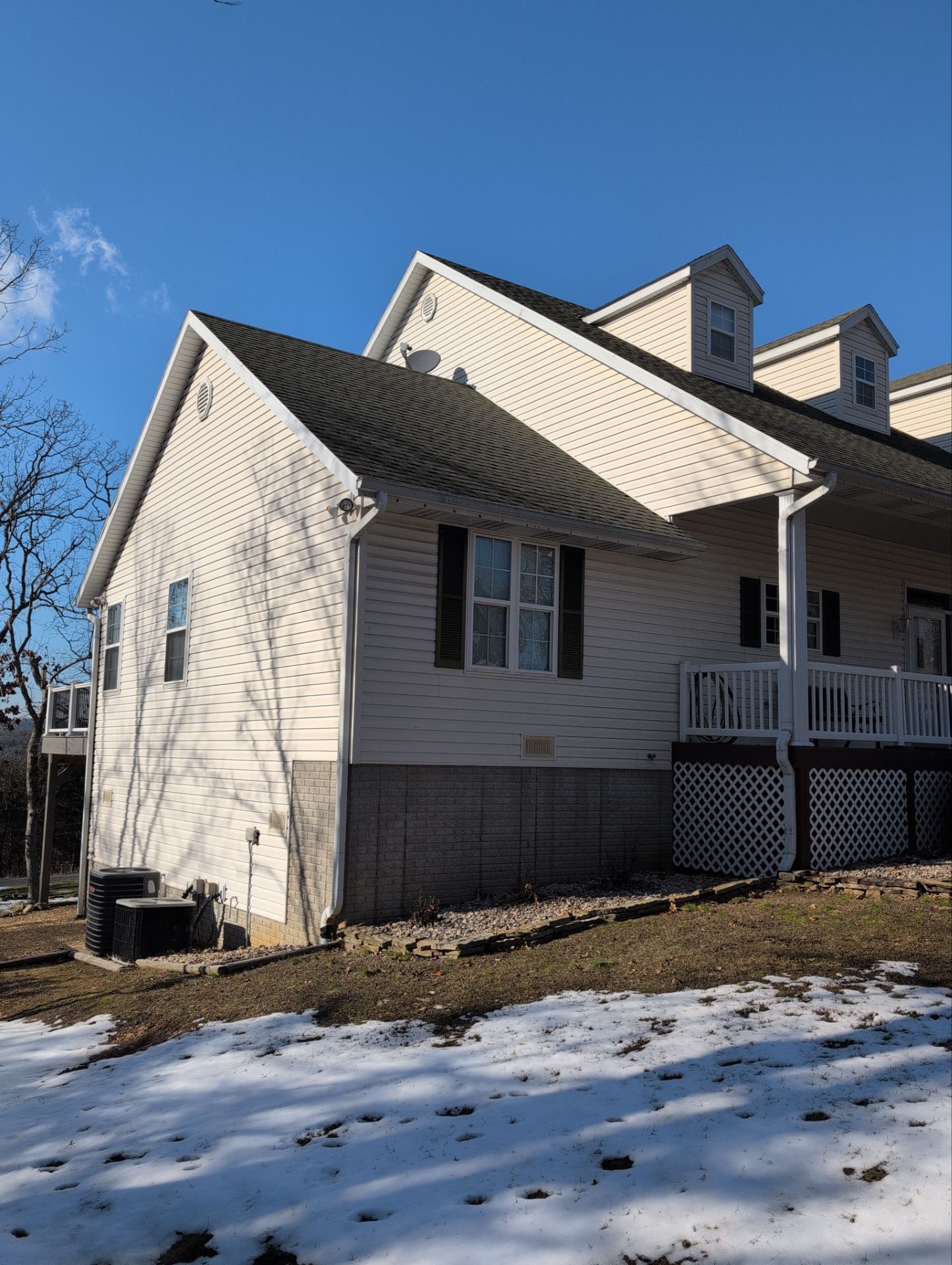 Roof Replacement & Gutter Guards in Galena by Table Rock Design + Build