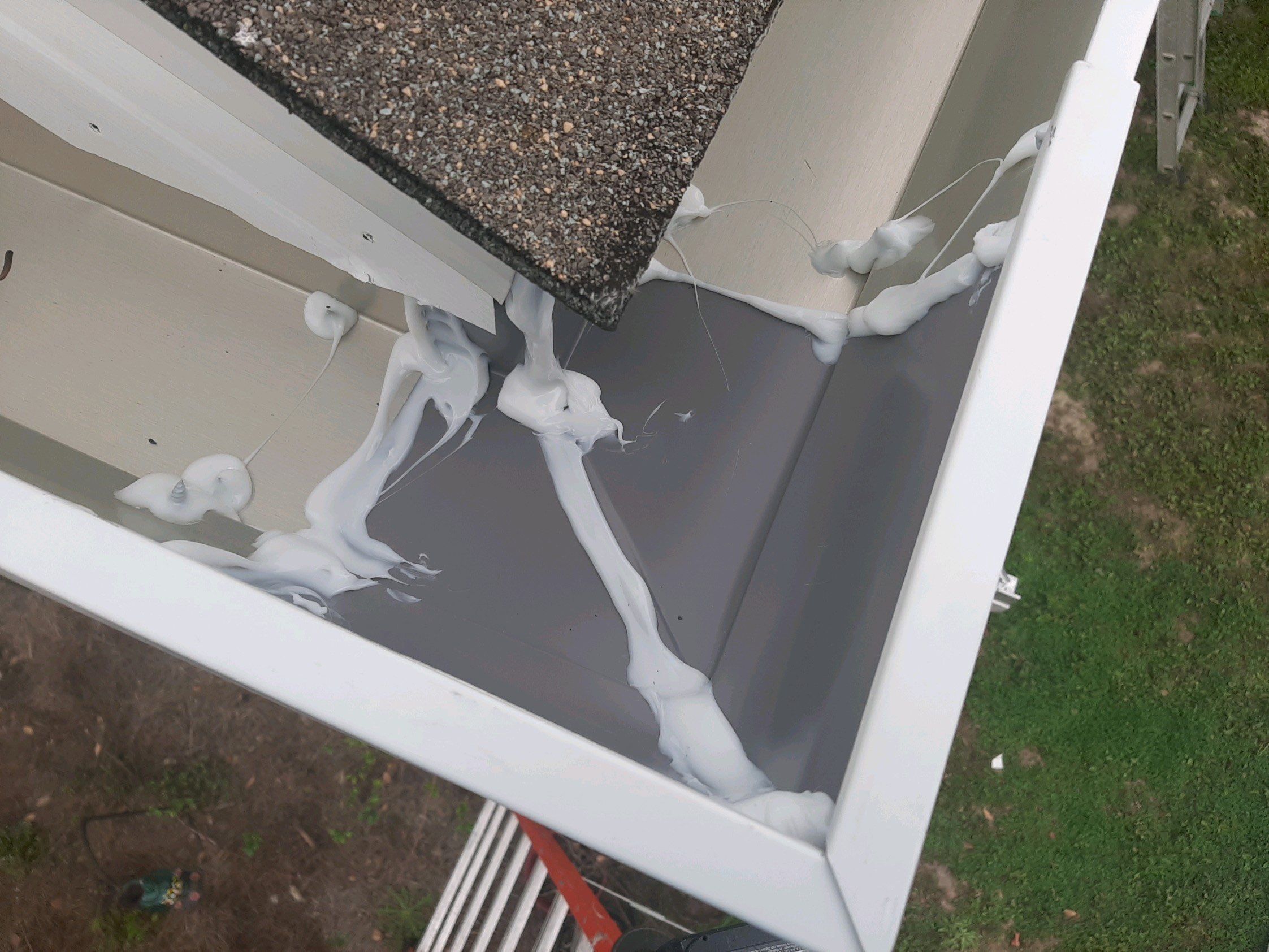 Gutter Installation Using White K-Style Seamless Gutters by Gutter Professors