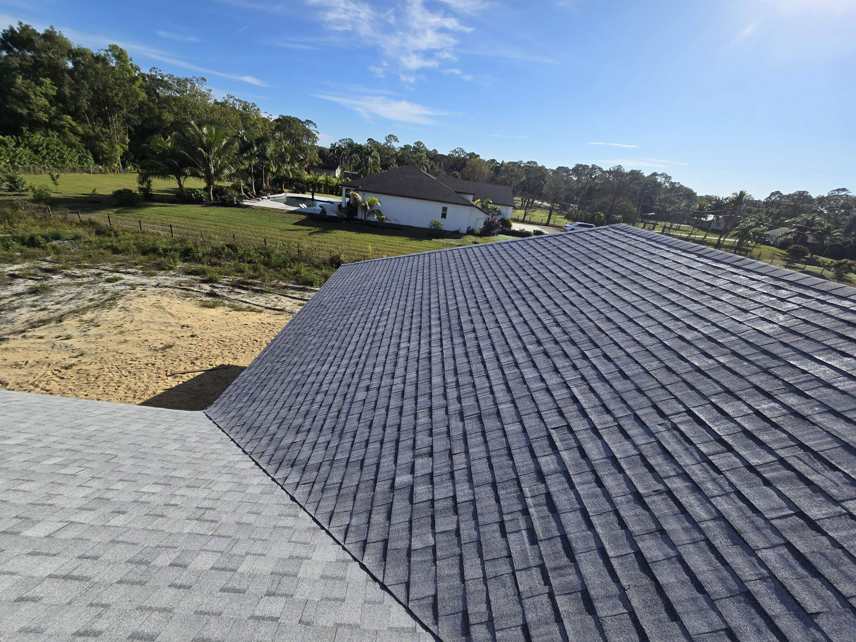 Tamko Heritage Glacier White by Total Roofing System The Metal Roof Experts