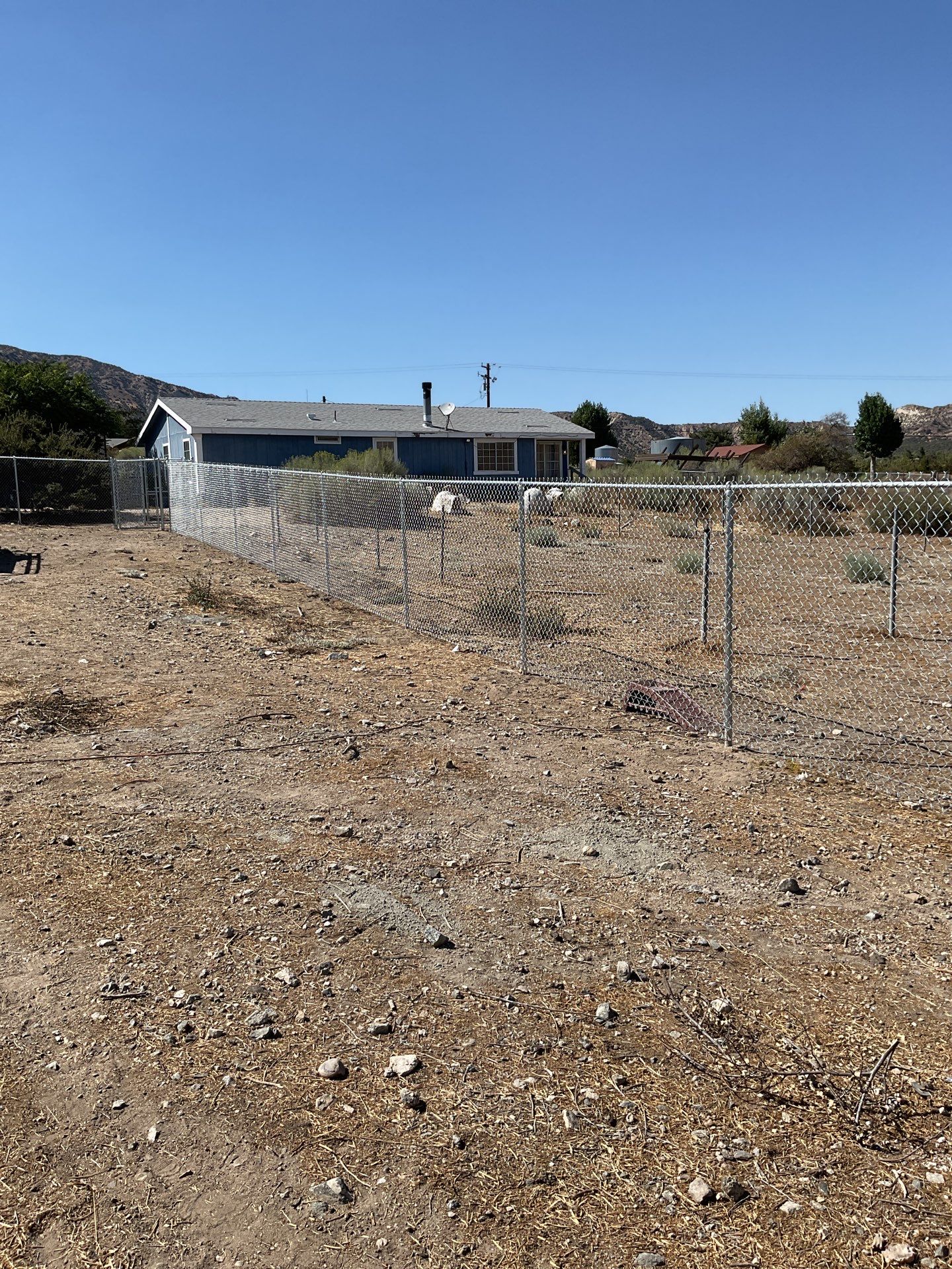 Fence Installation using chain -link by Fence Guys Inc.