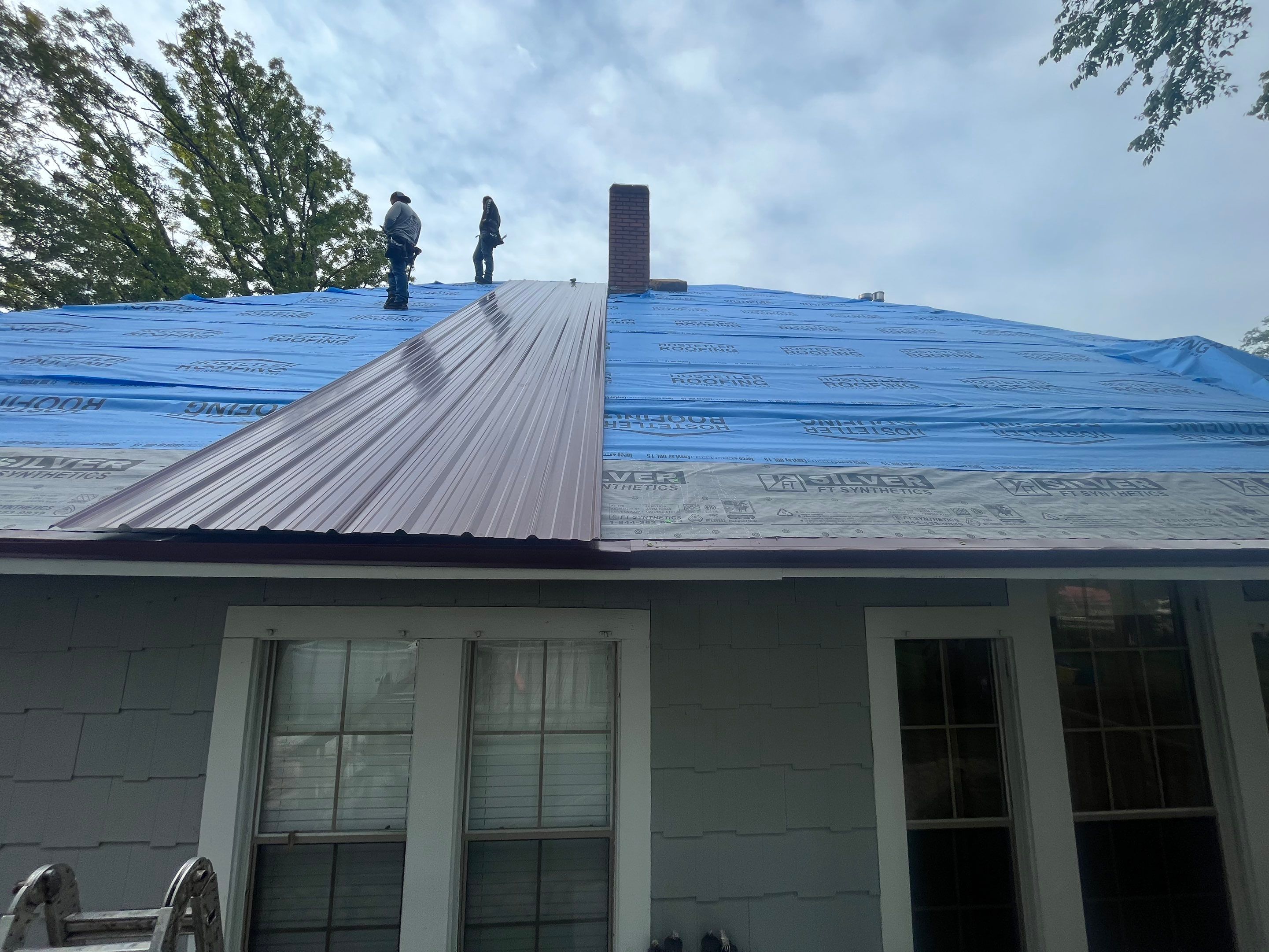 Residential Metal Roof Replacement using Reed's Metals: Colored Residental Panel (Burgundy) by Hostetler Roofing