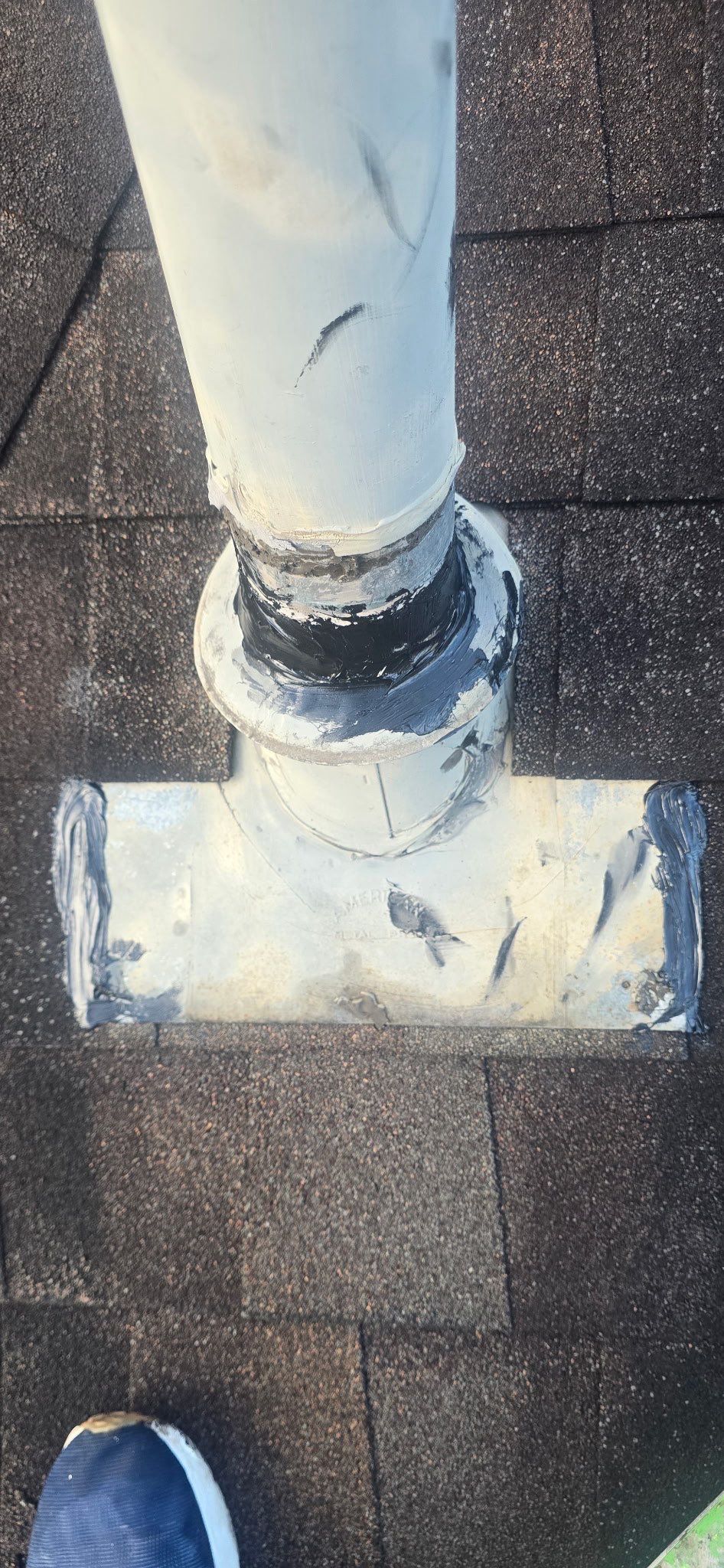 Water Heater Vent Collar Reseal by Black Coast Roofing