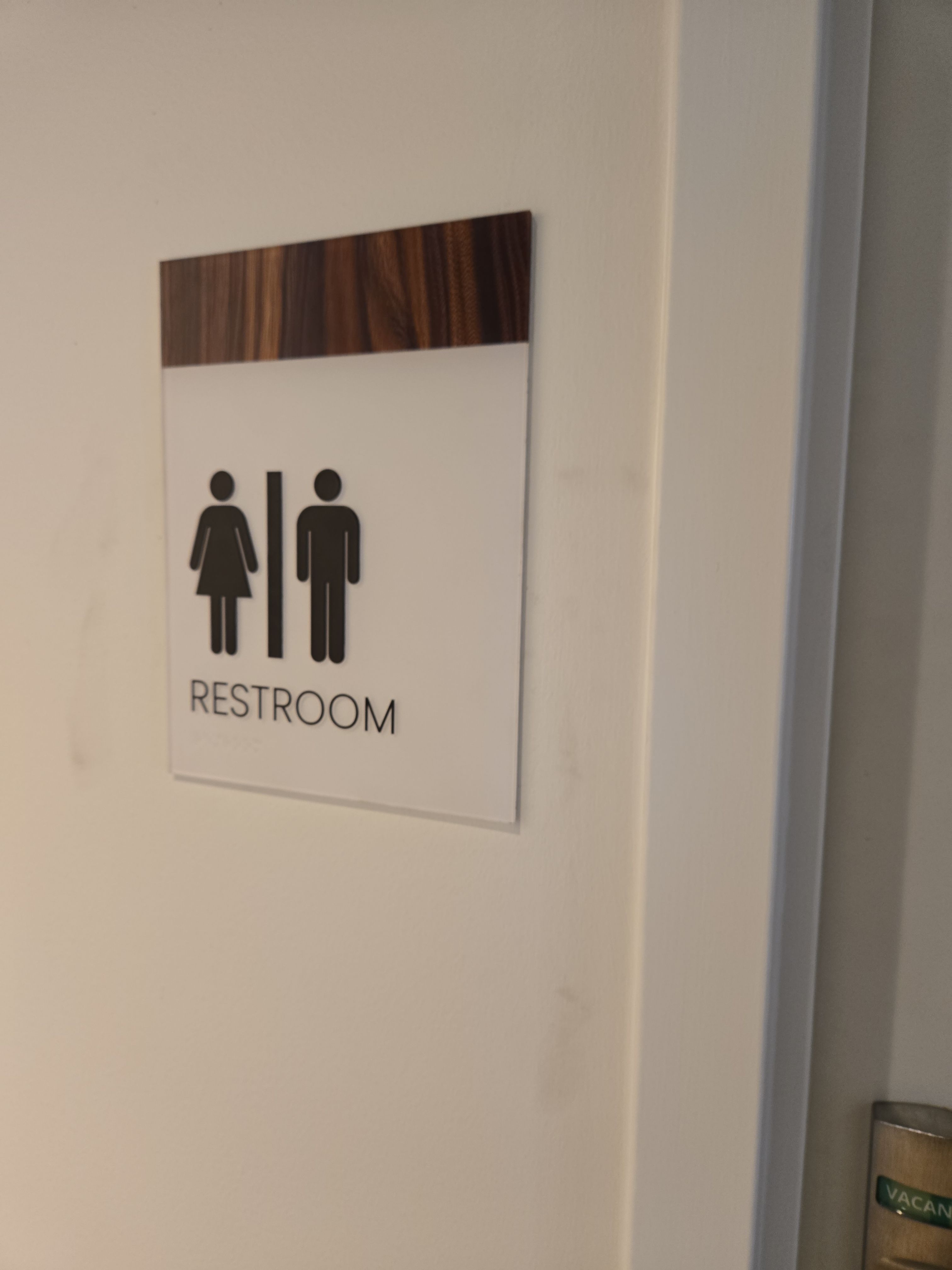 Interior ADA Restroom Signage with Wood Grain Accents by Hayes Design co