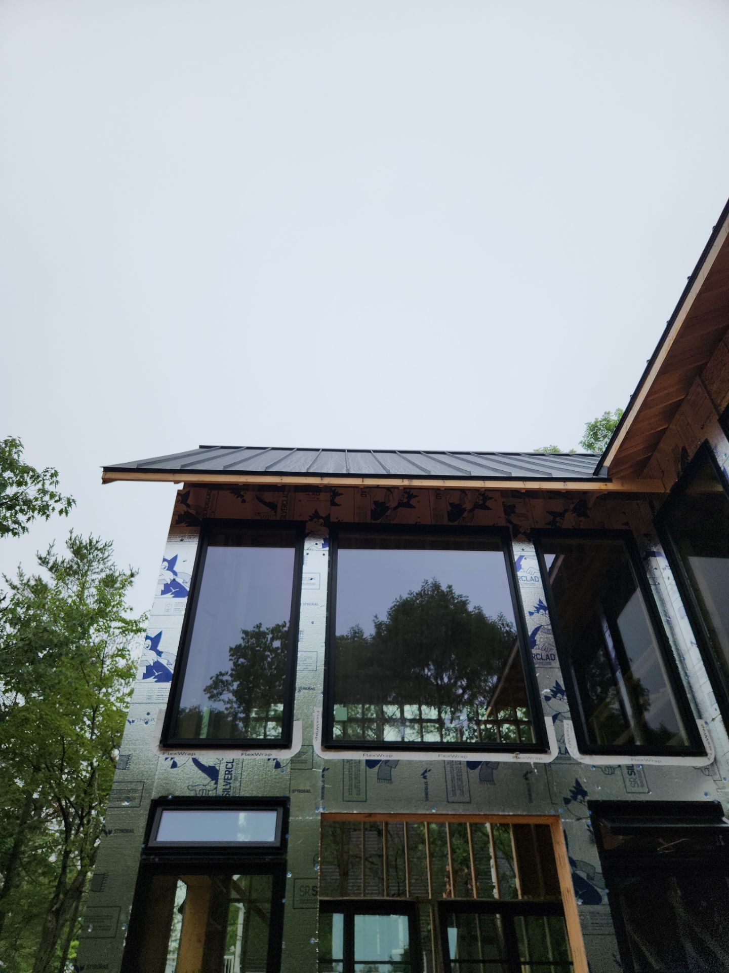 Custom Home Roofing – Matte Black Standing Seam by Jay Carter Roofing & Sheet Metal