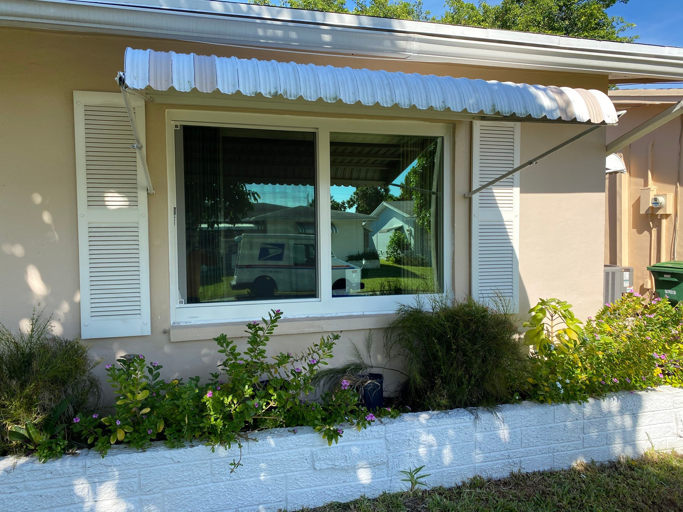 Tamarac Residential Entry Door and Aluminum Window Installation Project by The Door Doctor of South Florida, Inc.