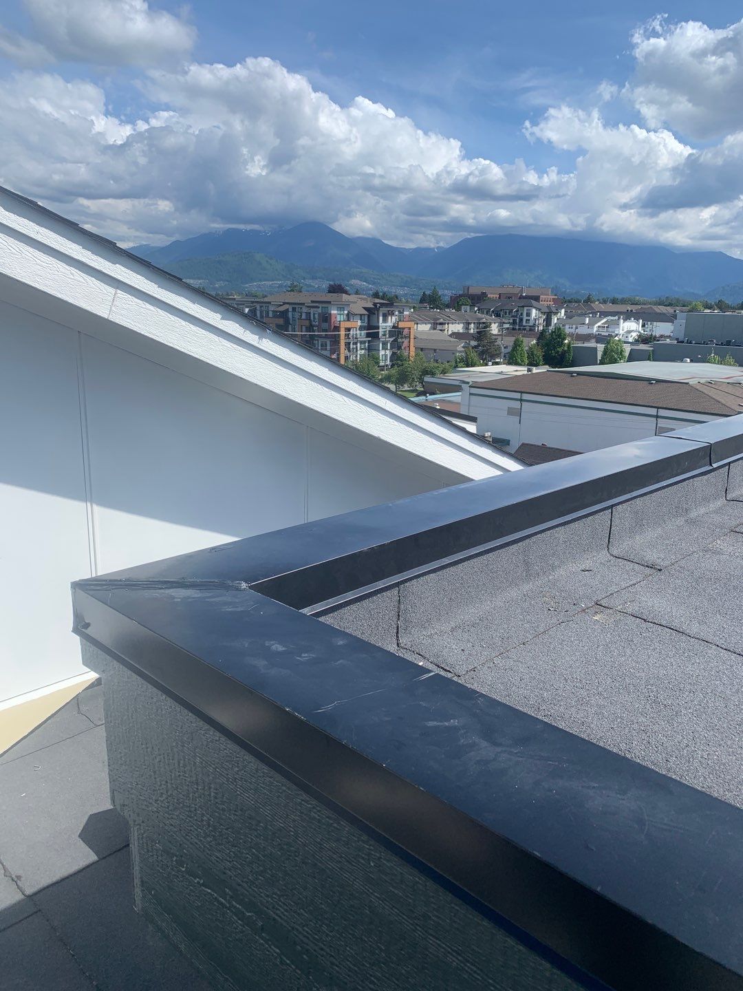 Large apartment with sbs, shingles and prolok metal  by Top Notch Roofing Inc