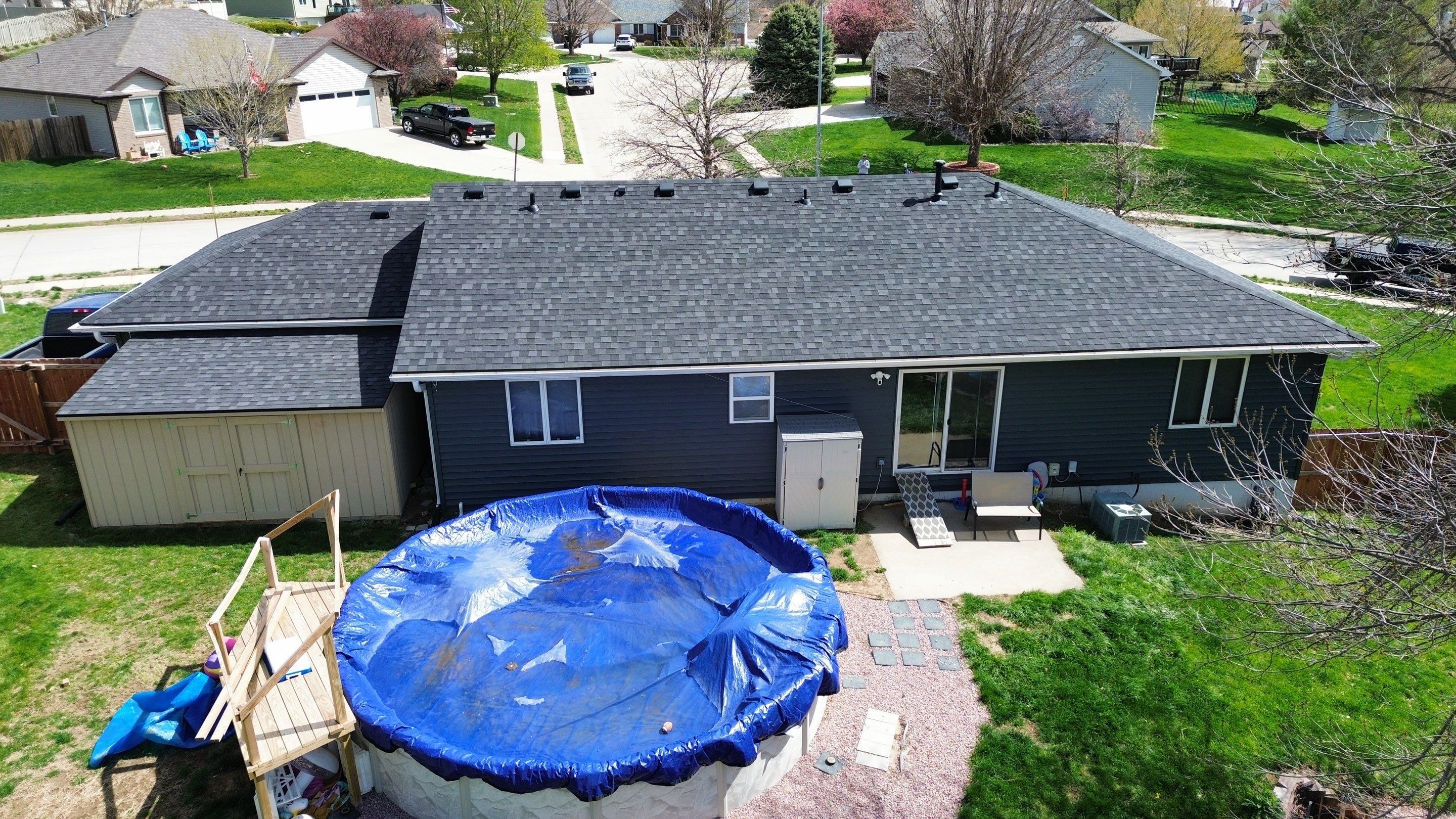 Roofing / Siding / Gutters using IKO Dynasty Granite Black / Norandex Siding by Lightning Exteriors