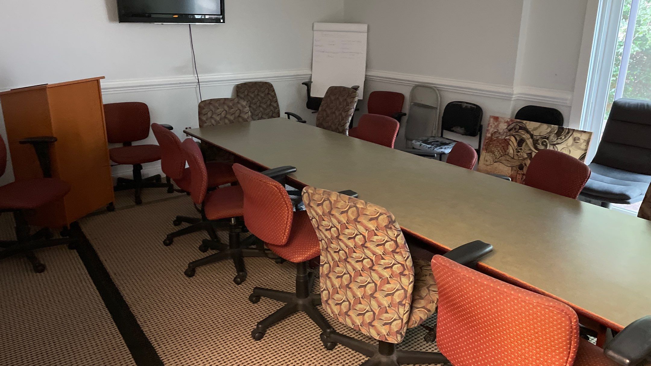 Office Remodel from Worn Out Carpet to Sleek Glued Down LVP by Footprints Floors of Coastal Carolina