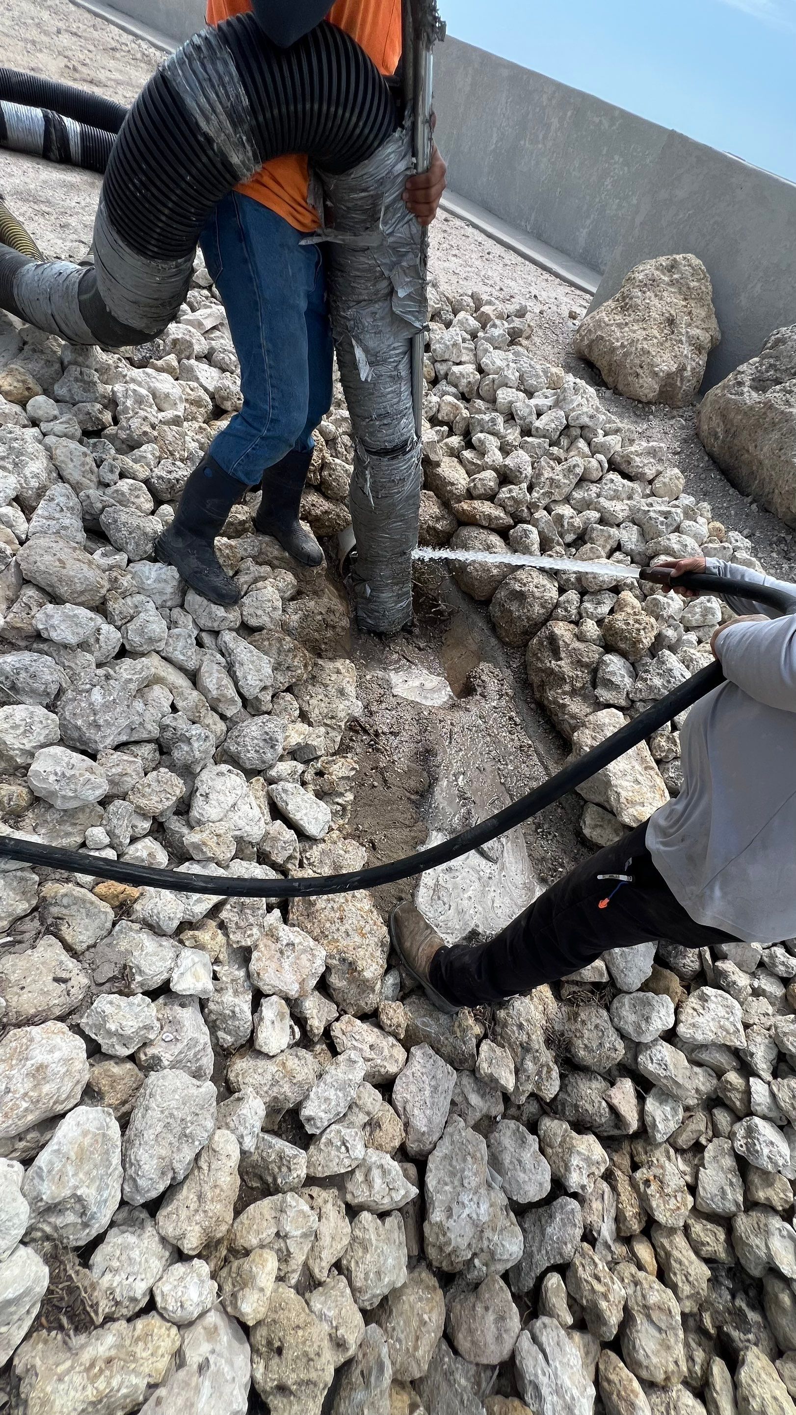 Isles of Capri Condo Parking Garage Drainage System Cleaning by APS Power & Water