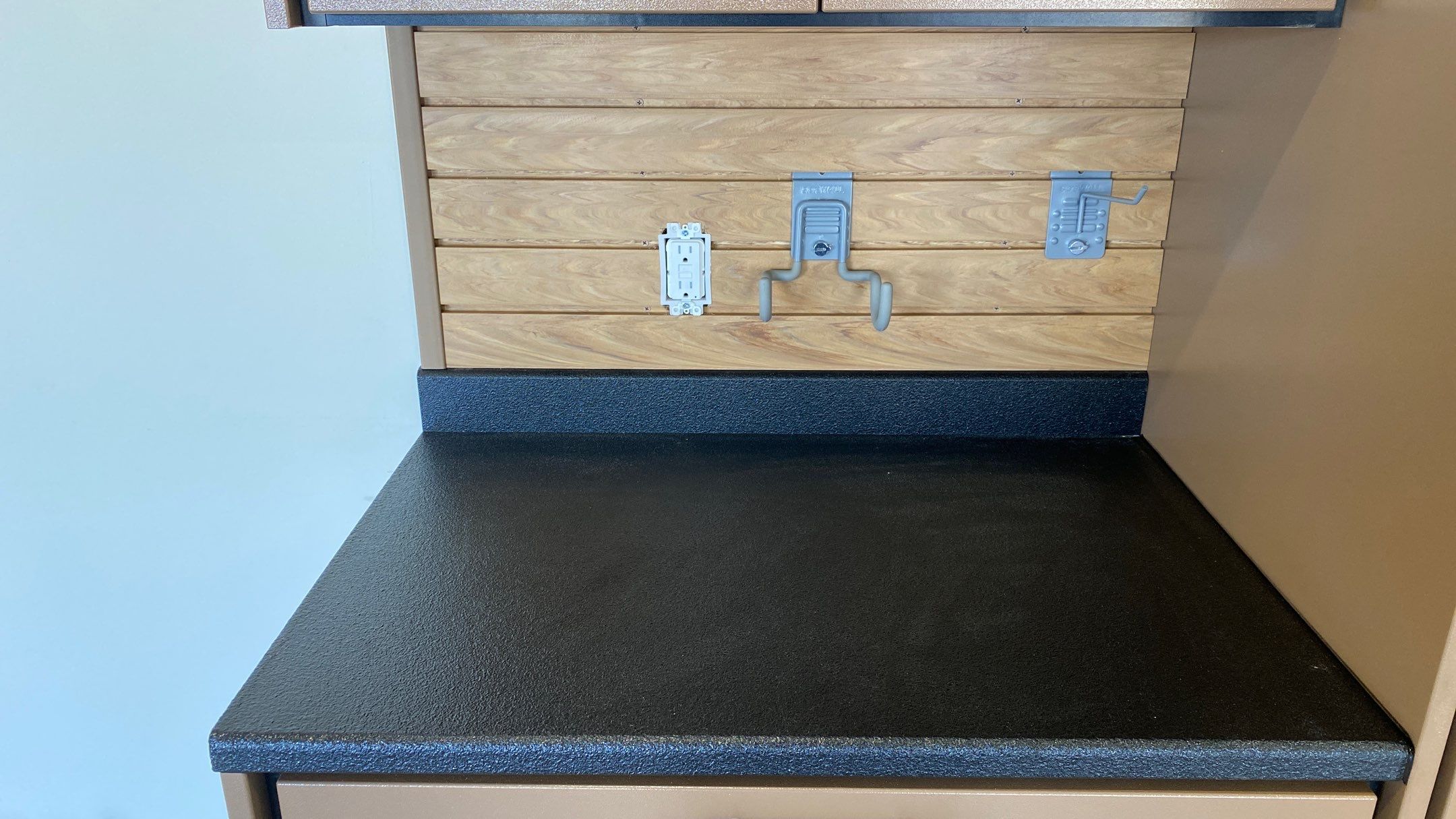 Kenny & Debbie transformed their garage with a Banner Garage Floor and cabinets by Banner Garage