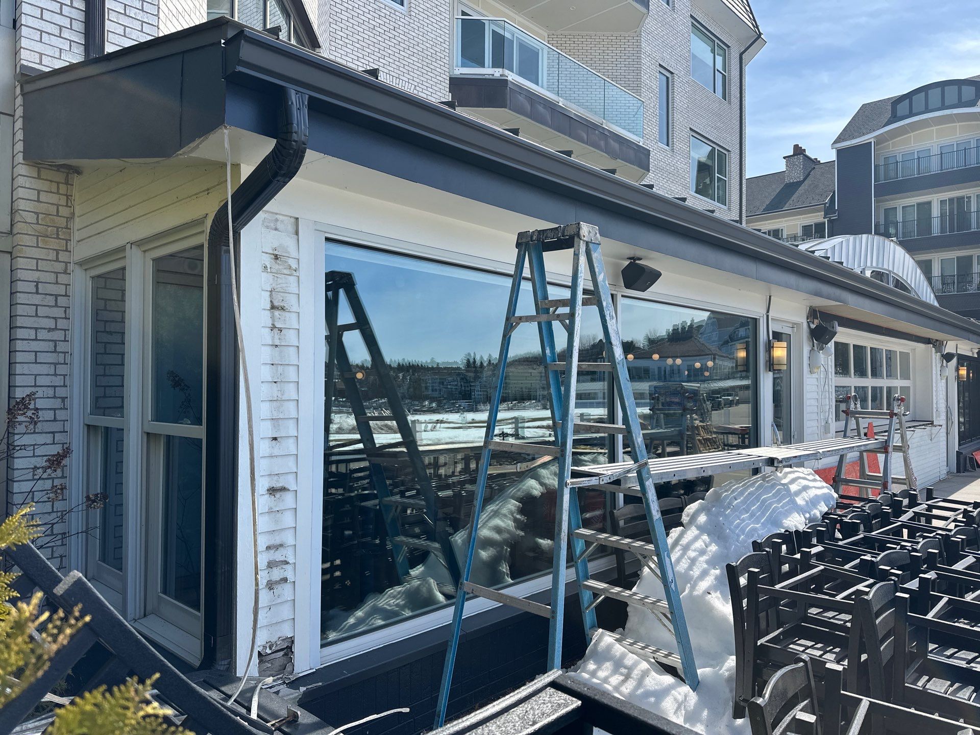 Commercial Gutter Installation for Bay Harbor Restaurant by Rainbow Seamless Systems