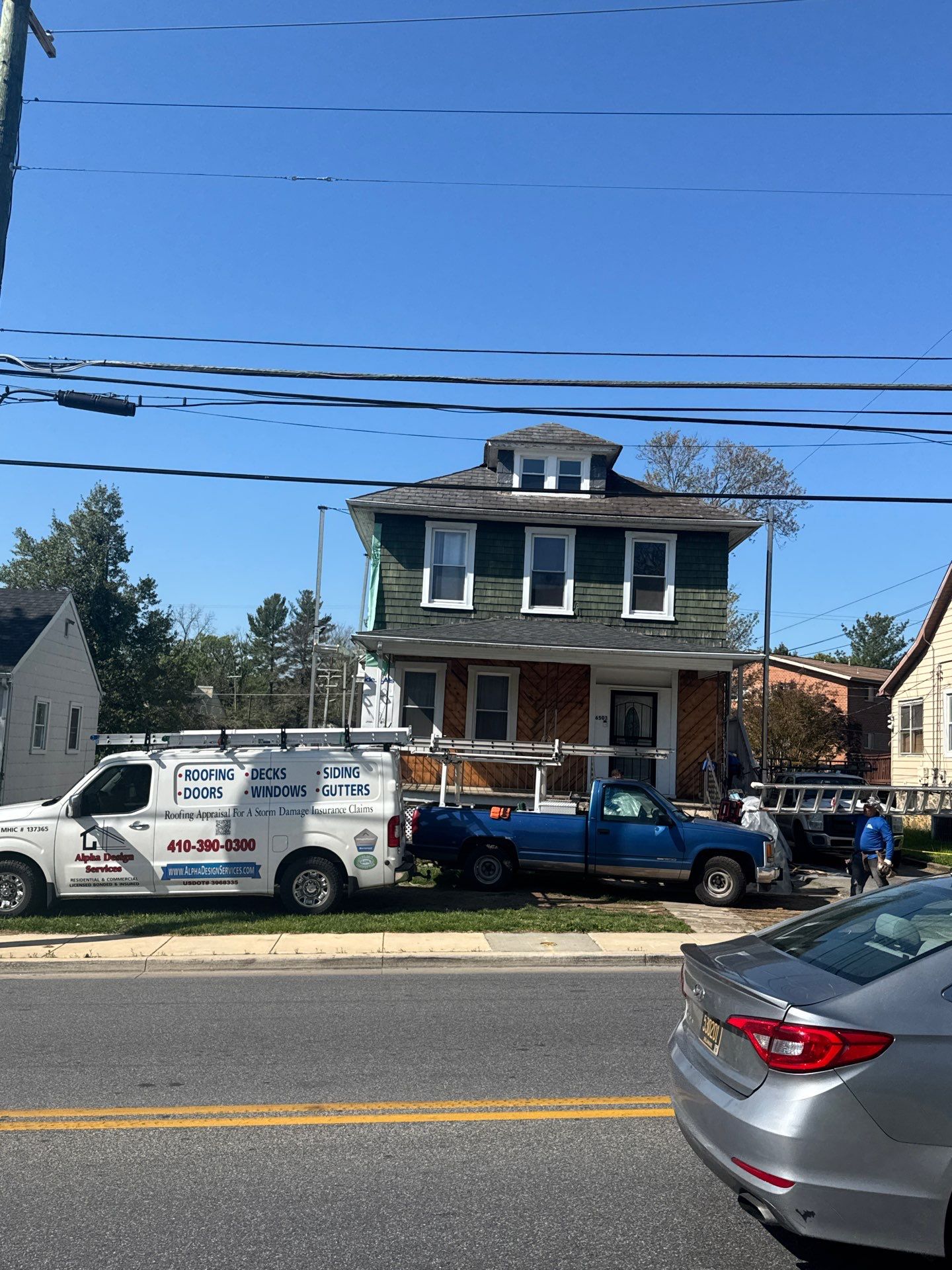 New siding & New Gutters by Alpha Design Services