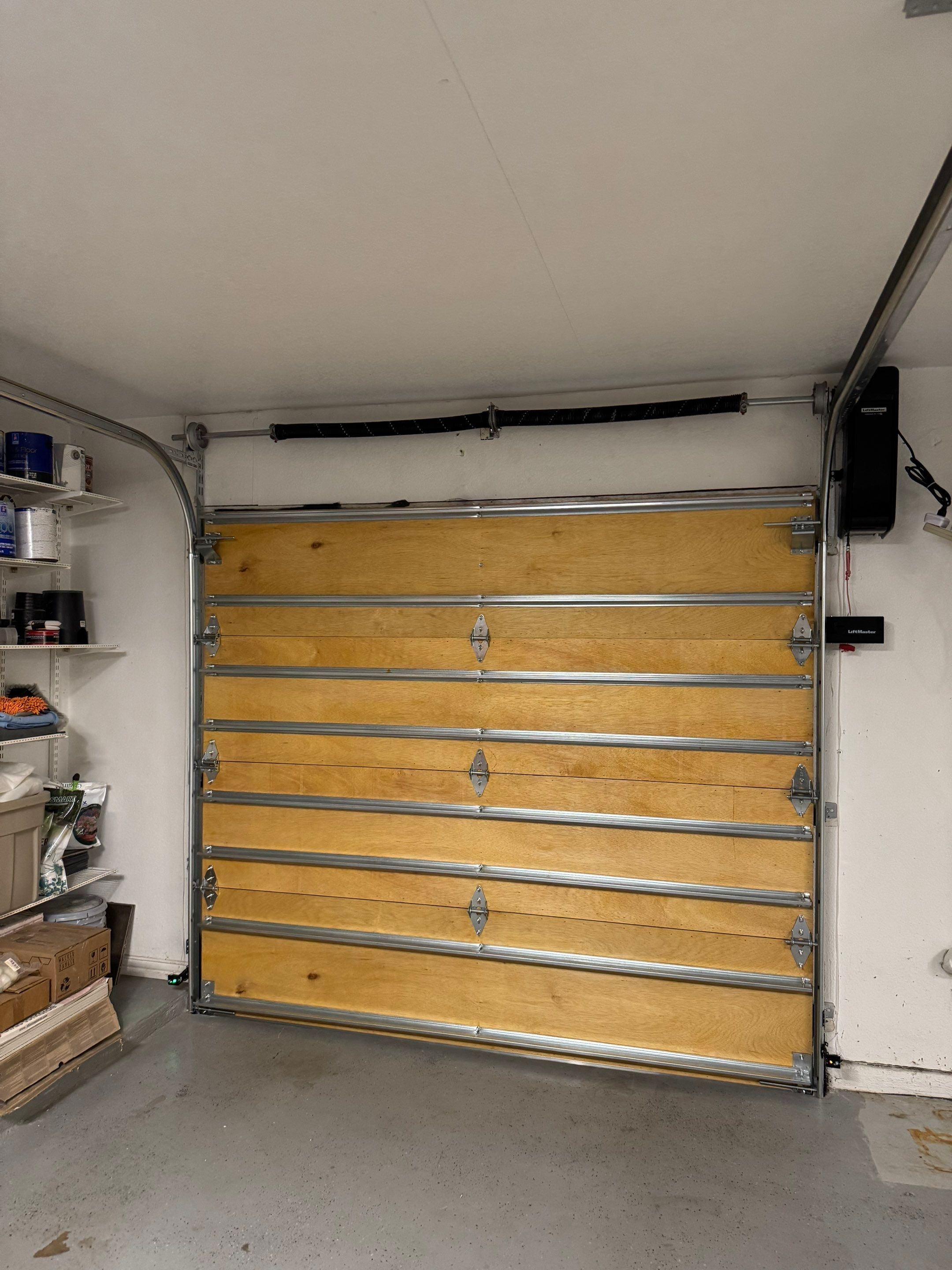 Custom Stained Cedar Garage Door Installation in Grapevine by Meadows Garage Doors