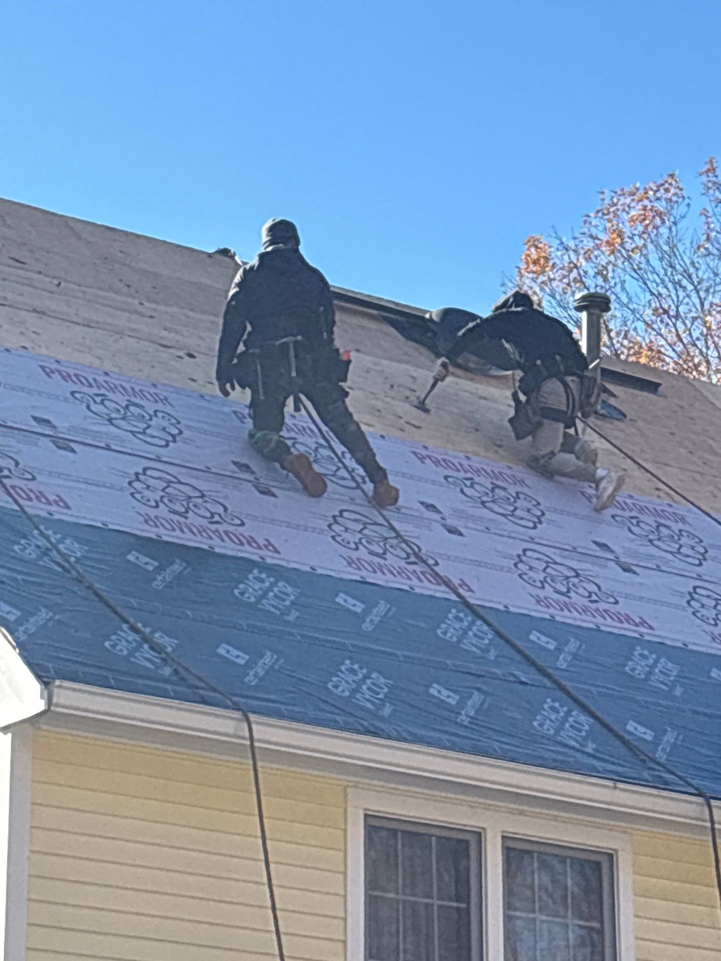 Chelmsford Premium Roof: Onyx Black Shingles with Standing Seam Metal Porch by Mighty Dog Roofing of Greater Middlesex County