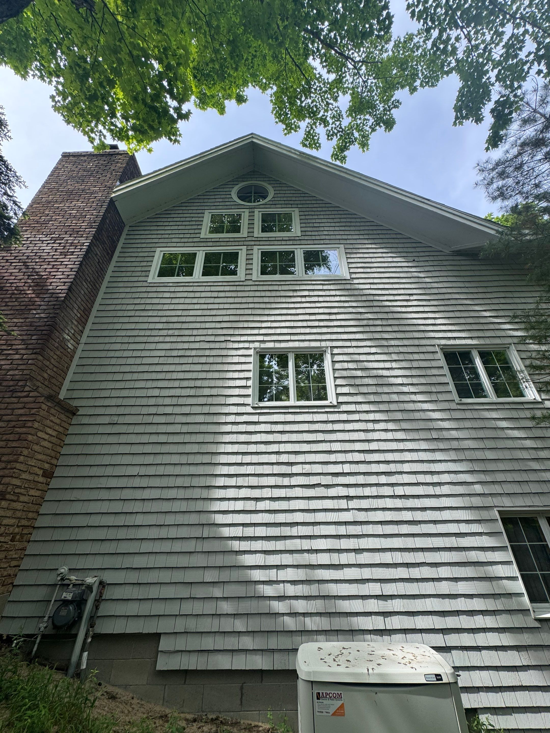 Lakefront Deck Pressure Washing, Exterior Wood Staining, and Painting in West Olive MI by Gordon Painting
