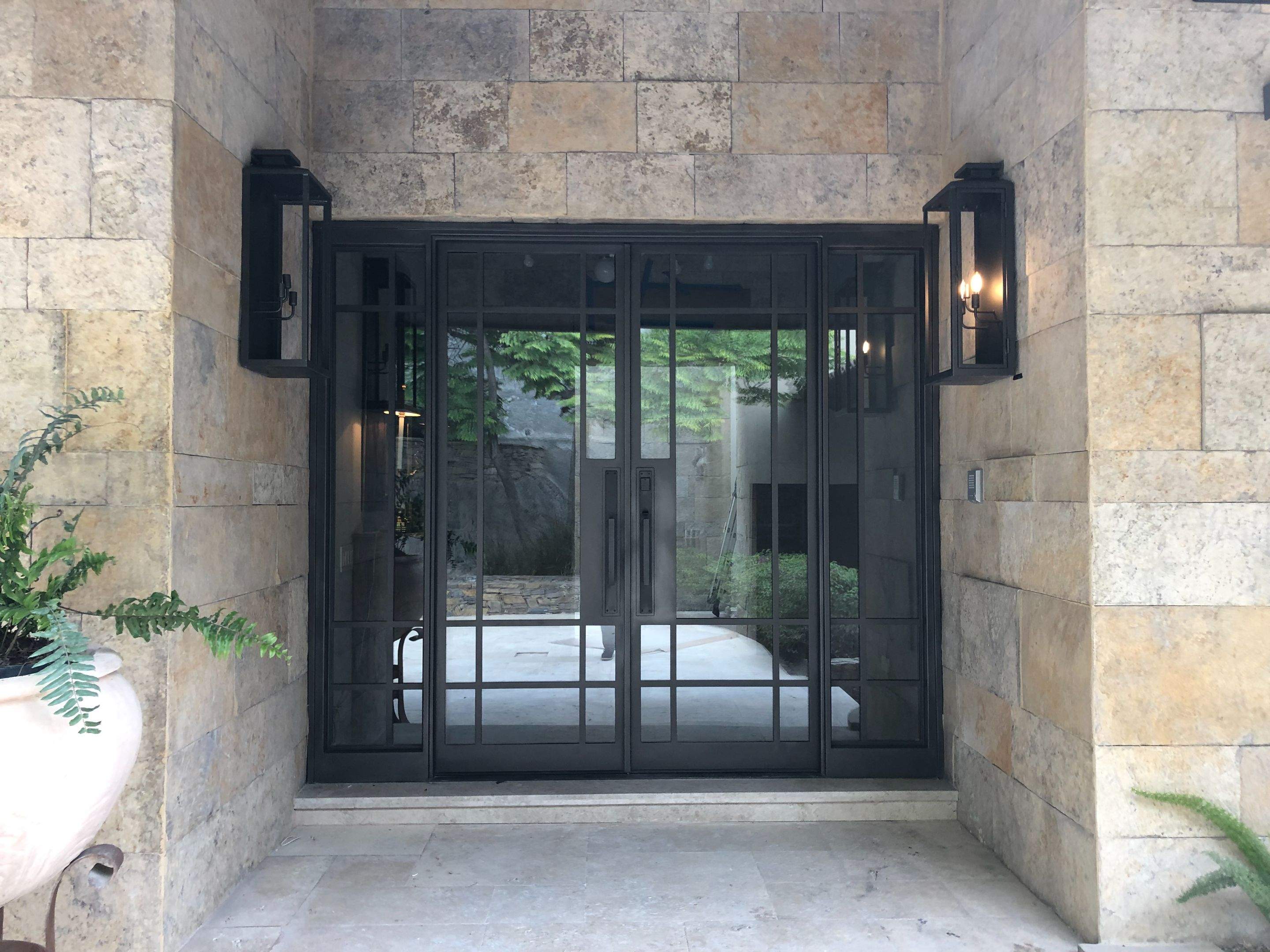 Custom Stone Entryway and Secure Perimeter Gate Installation in Monterrey by Solara Custom Living