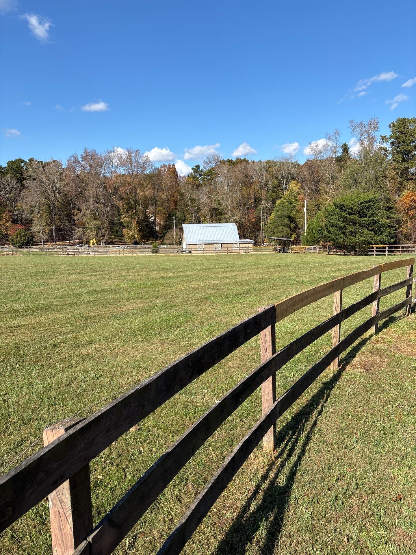 Fence Staining (Farm in Durham NC) by GonzalezPainters & Contractors Inc 