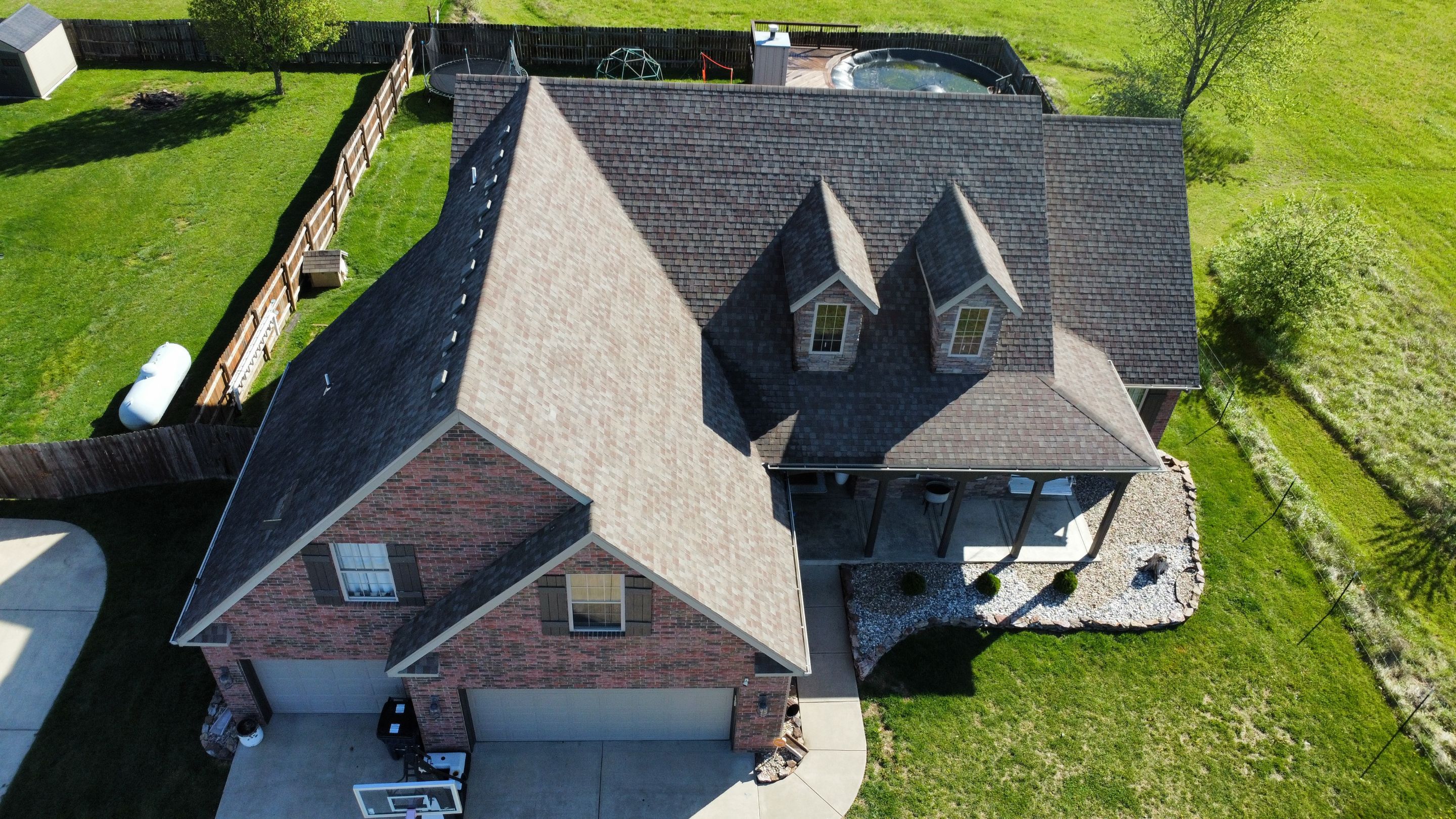 Residential Roof + Gutters & Downspouts Install  by Titan Commercial & Residential Roofing 