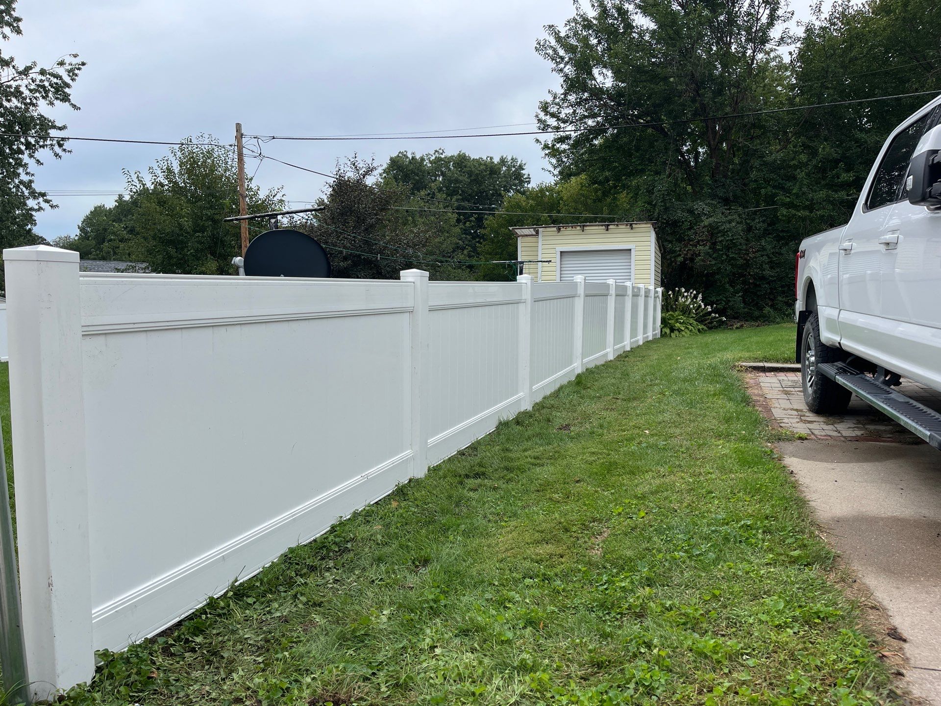 New White Vinyl Privacy Fence and Gate Installation in Waterloo by Perfect Picket Fence and Stain