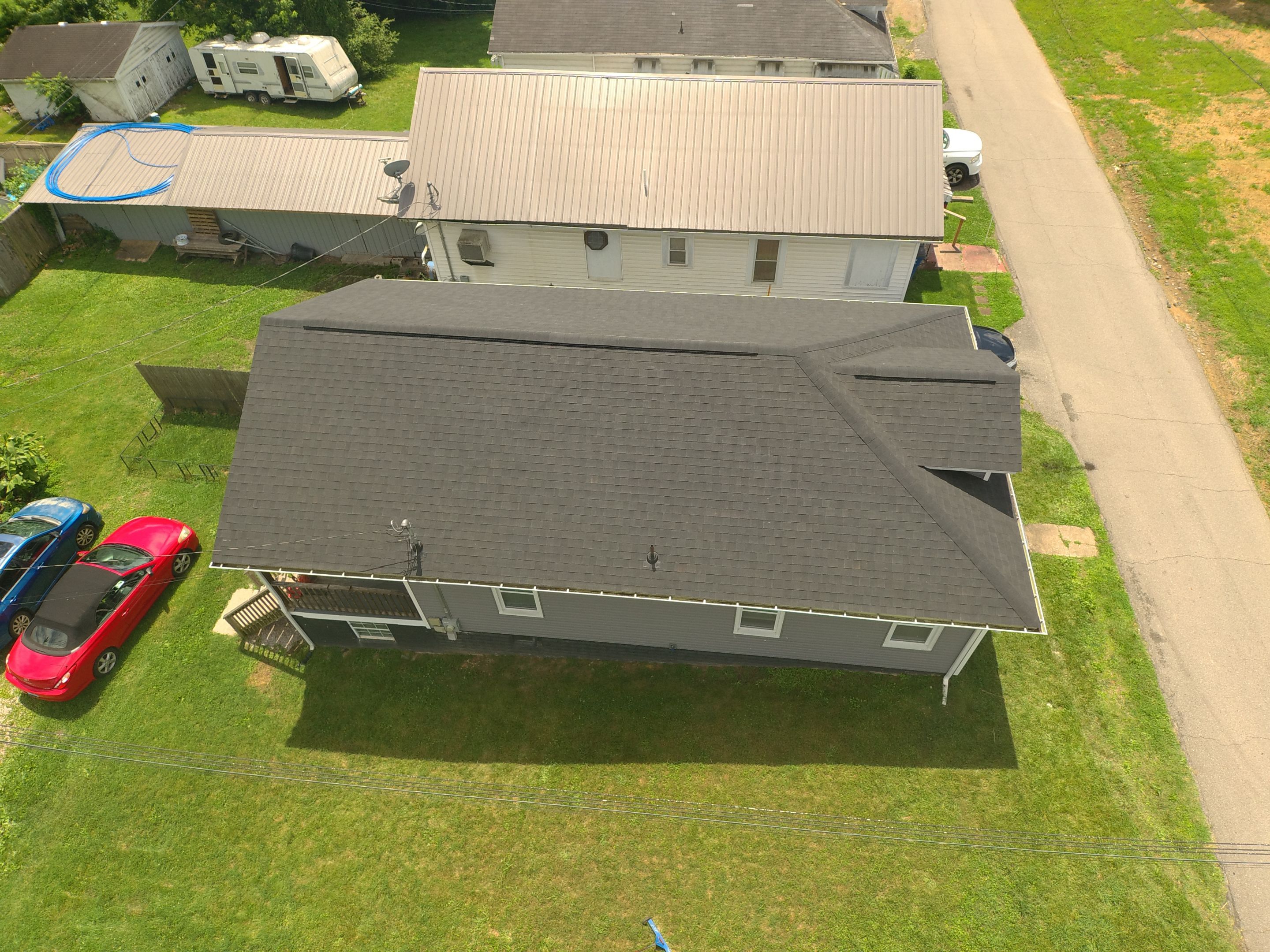Matte Black Elegance: IKO Dynasty Roof Transformation in Ashland, KY by Mr. Roofer