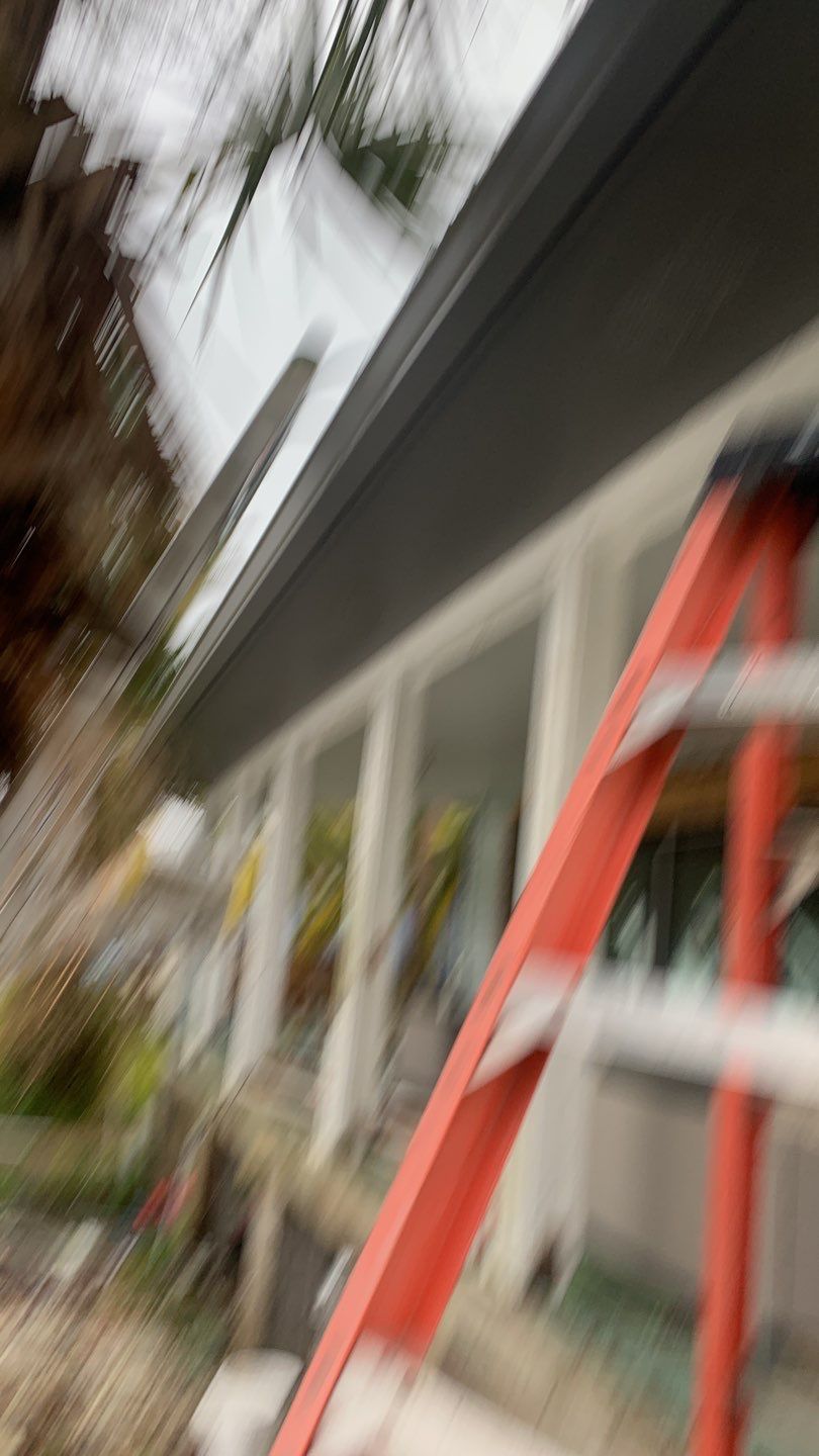 Seamless Gutter Installation using Charcoal Grey Gutters by Gutter Professors