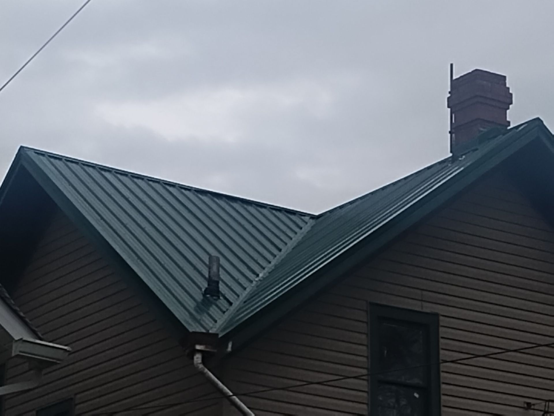 Residential Roofing Installation using Metal by Mr. Roofer