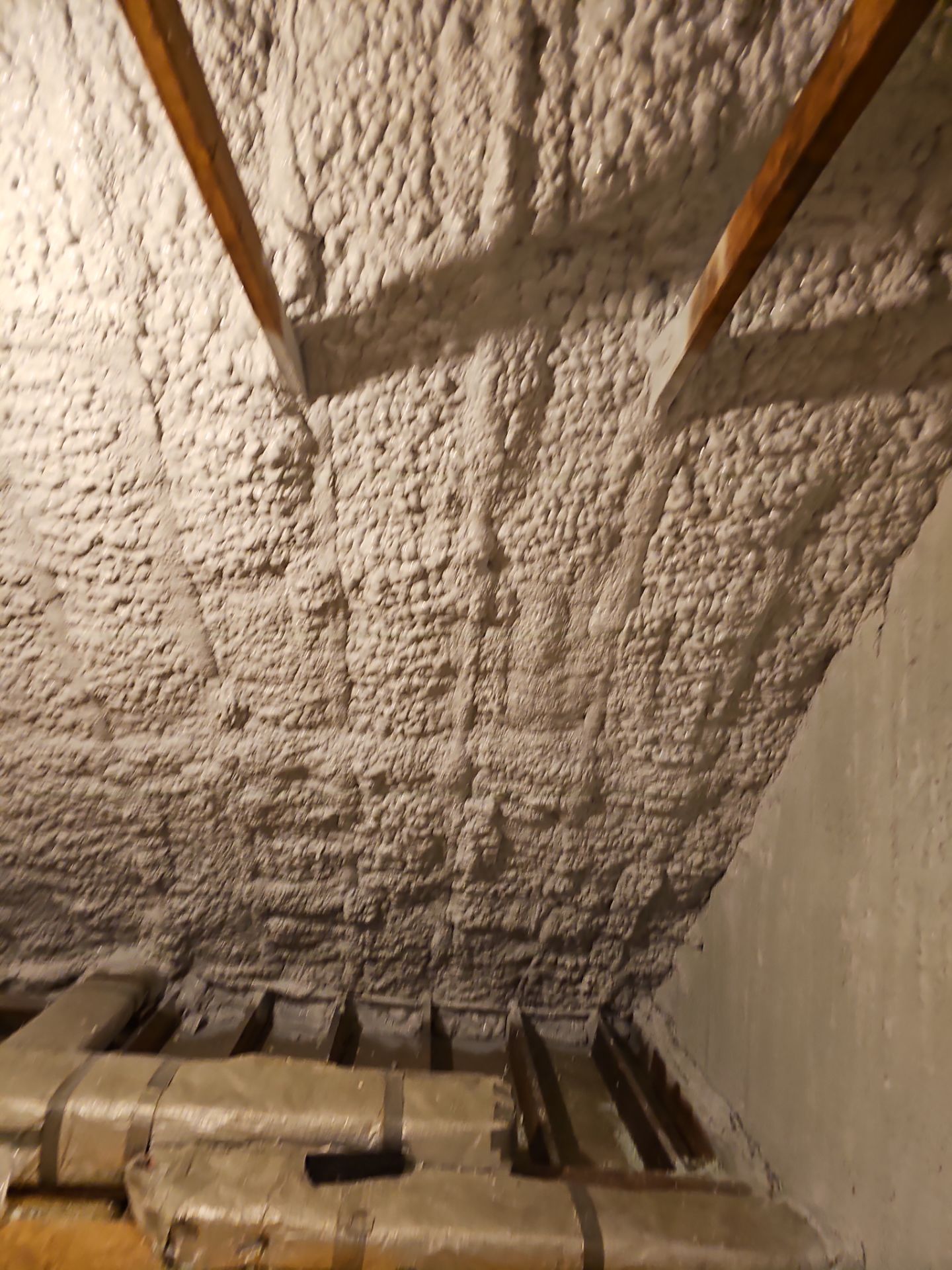 Attic Retrofit using open cell spray foam by NYS Foam & Energy