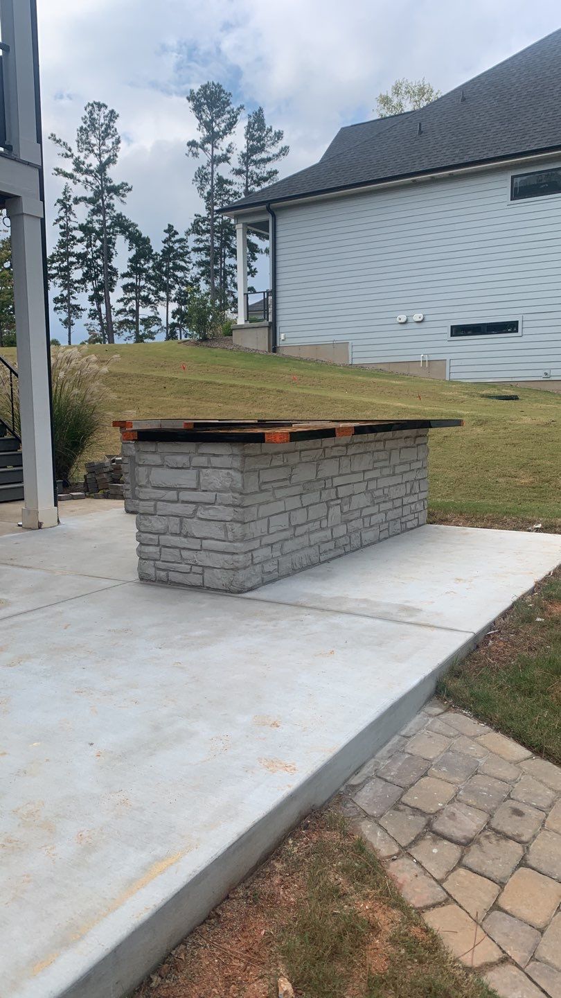 Outdoor Kitchen on Lake Keowee by Xtreme Concrete Services