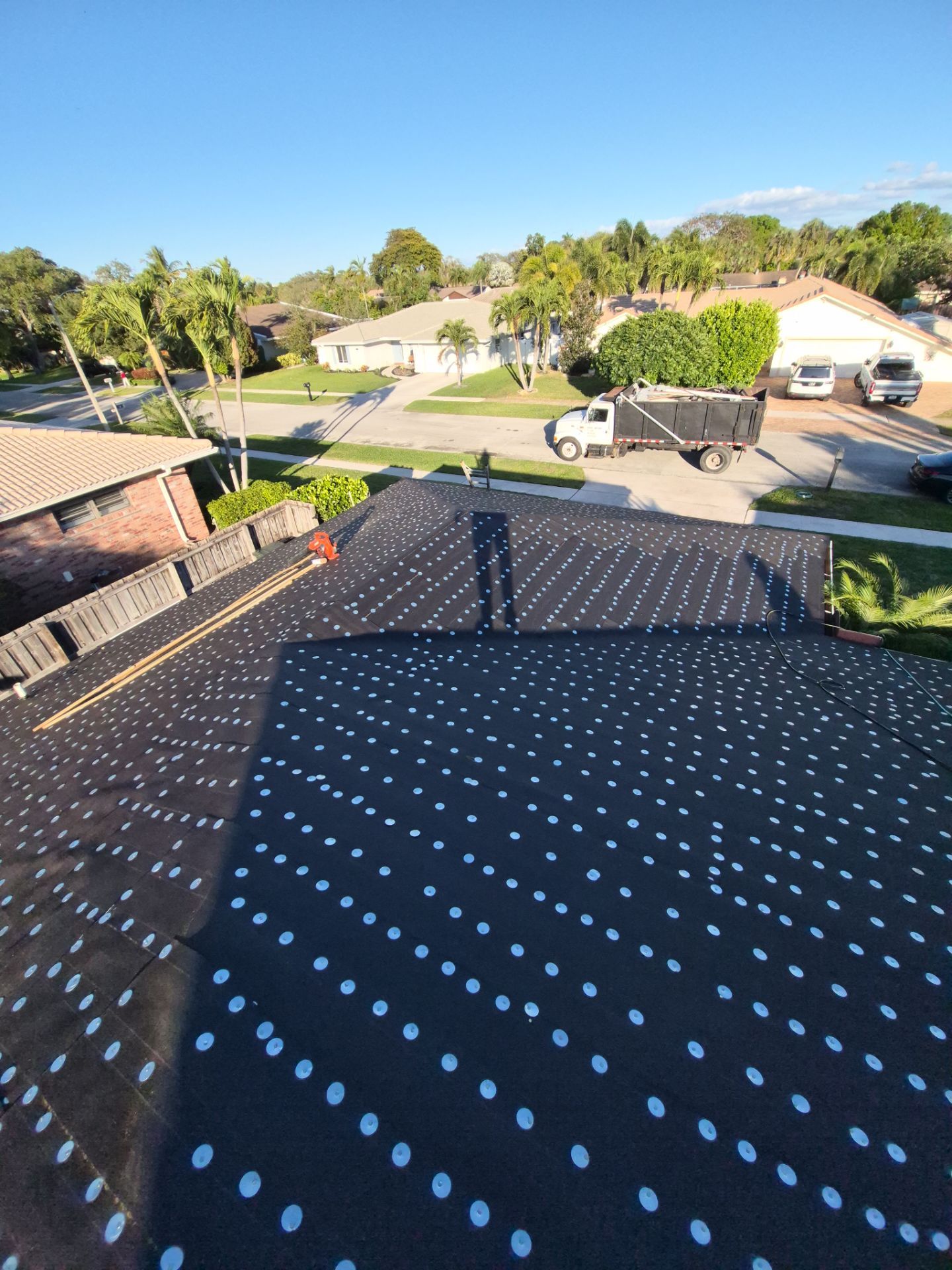 Residential Roofing Installation using 1" Nail strip metal roof by BLUES BROTHERS ROOFING